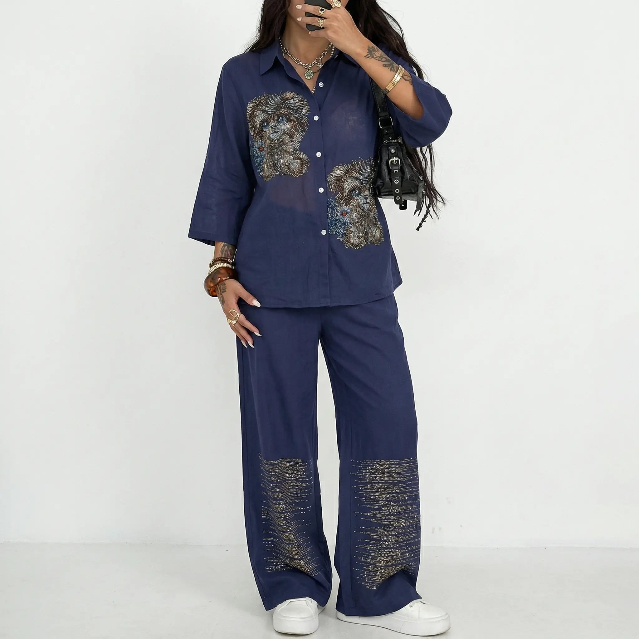 Person wearing a navy blue outfit with lion designs on a white background， TCH Navy Rhinestone Dog Matching Set