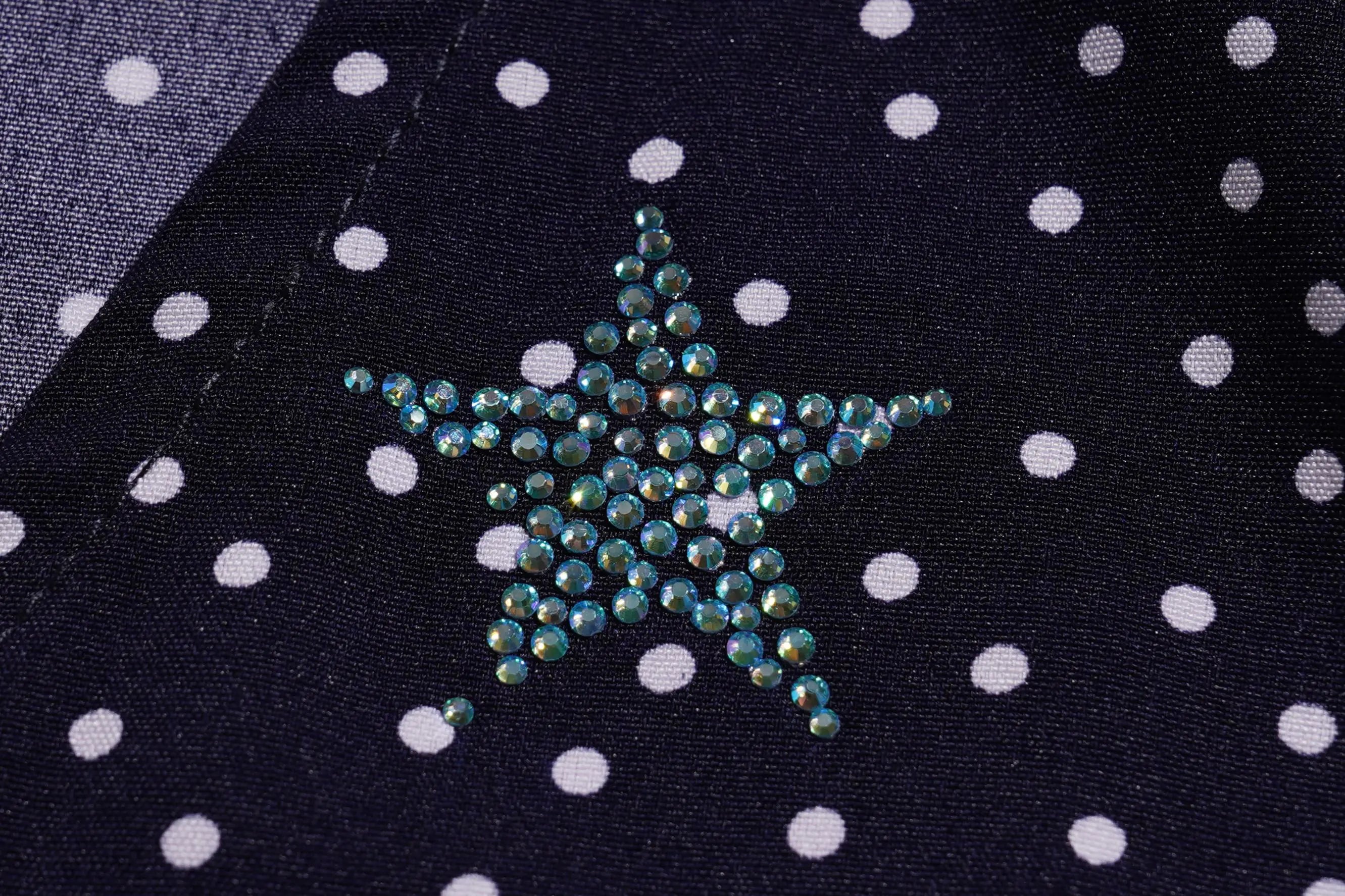 Star-shaped embellishment on a fabric with polka dots, TCH Navy Teddy Bear Bow Rhinestone Dress