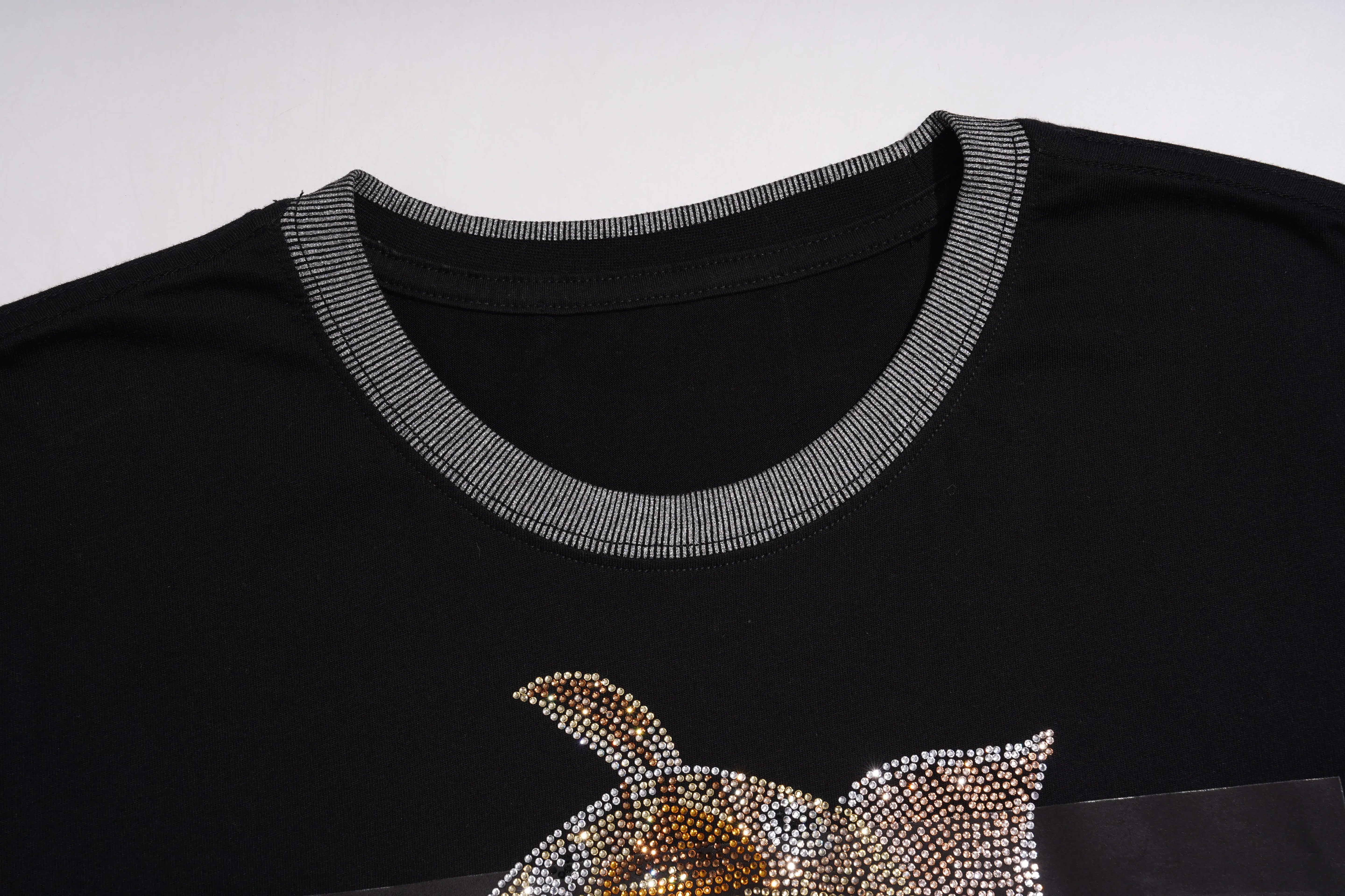Black shirt with a decorative cat design on a white background, TCH Piggy Techno Rhinestone T-Shirt