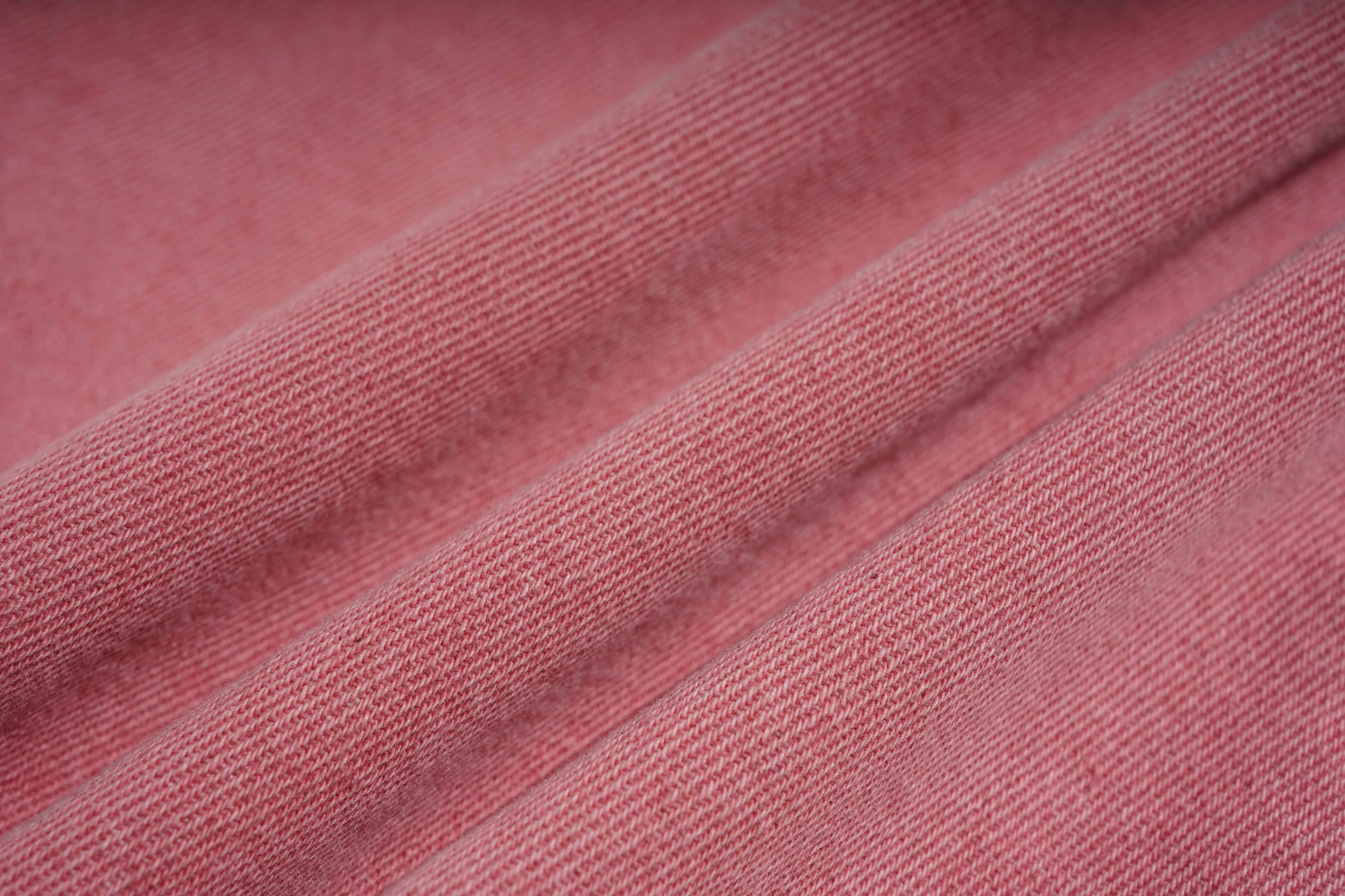 Close-up of pink textured fabric, TCH Pink Moonlight Rhinestone Denim Jeans