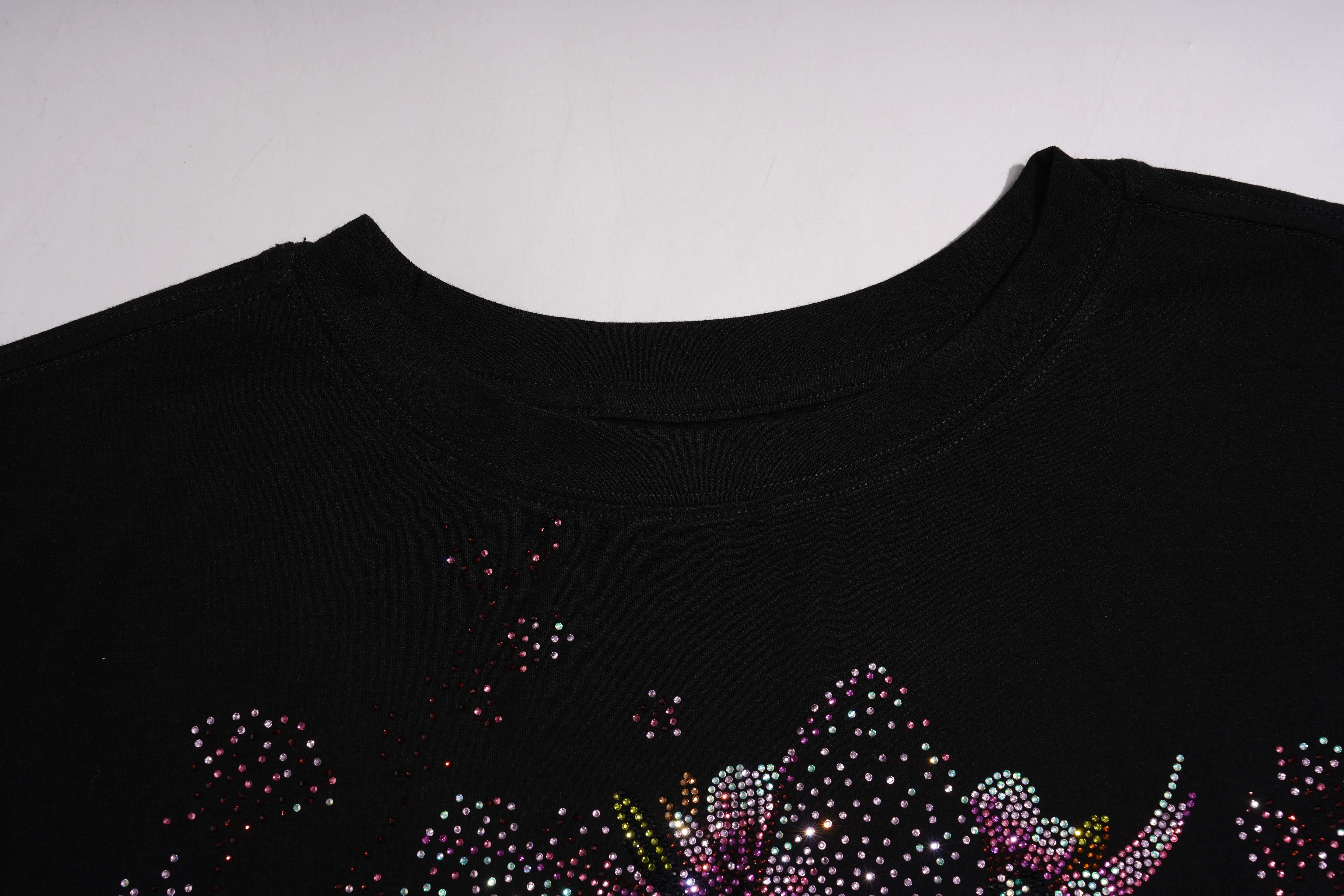 Black shirt with colorful rhinestone design on a white background, TCH Pink Snake Rhinestone Oversize T-Shirt