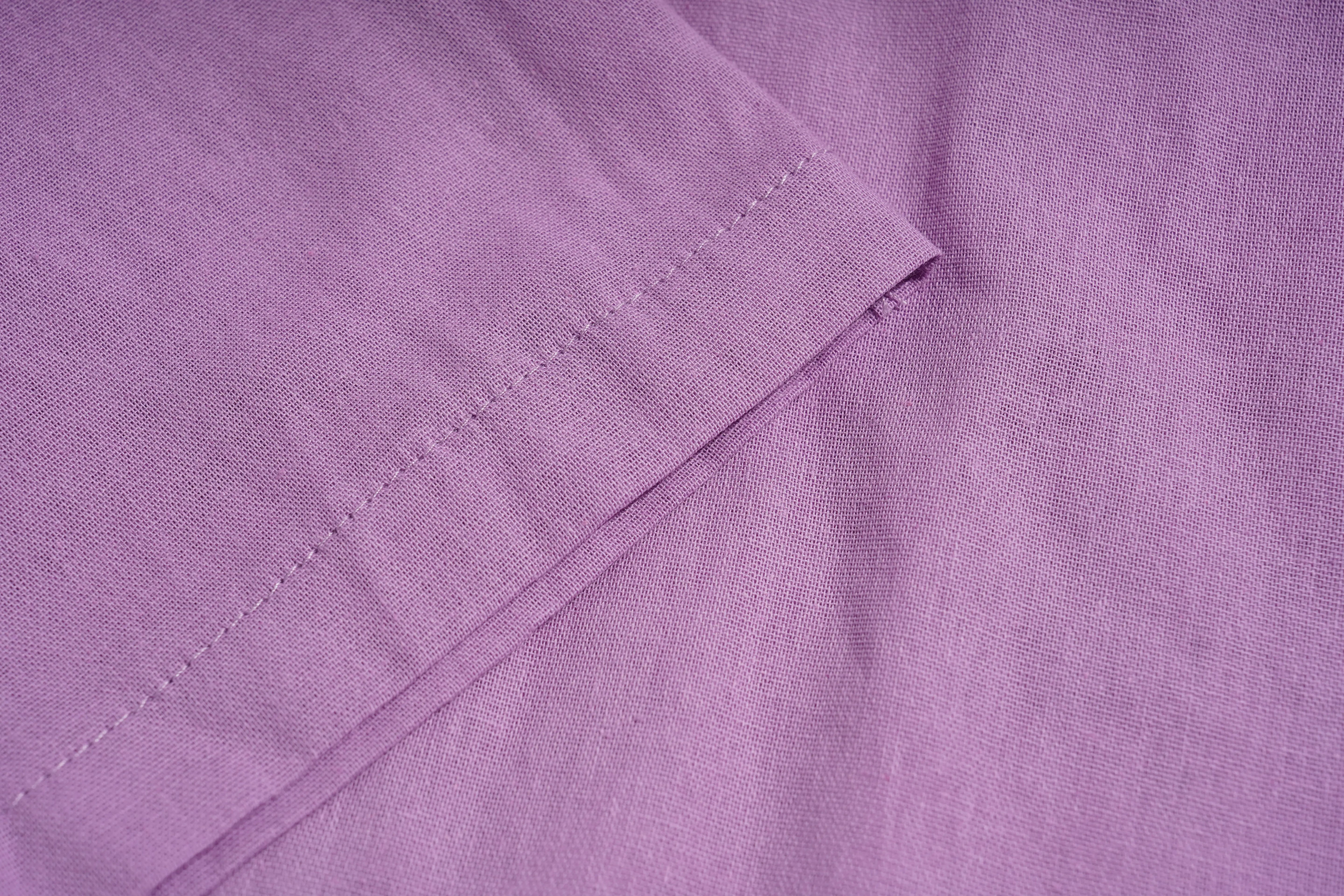 Close-up of purple fabric with a visible seam, TCH Purple Rhinestone Butterfly Set