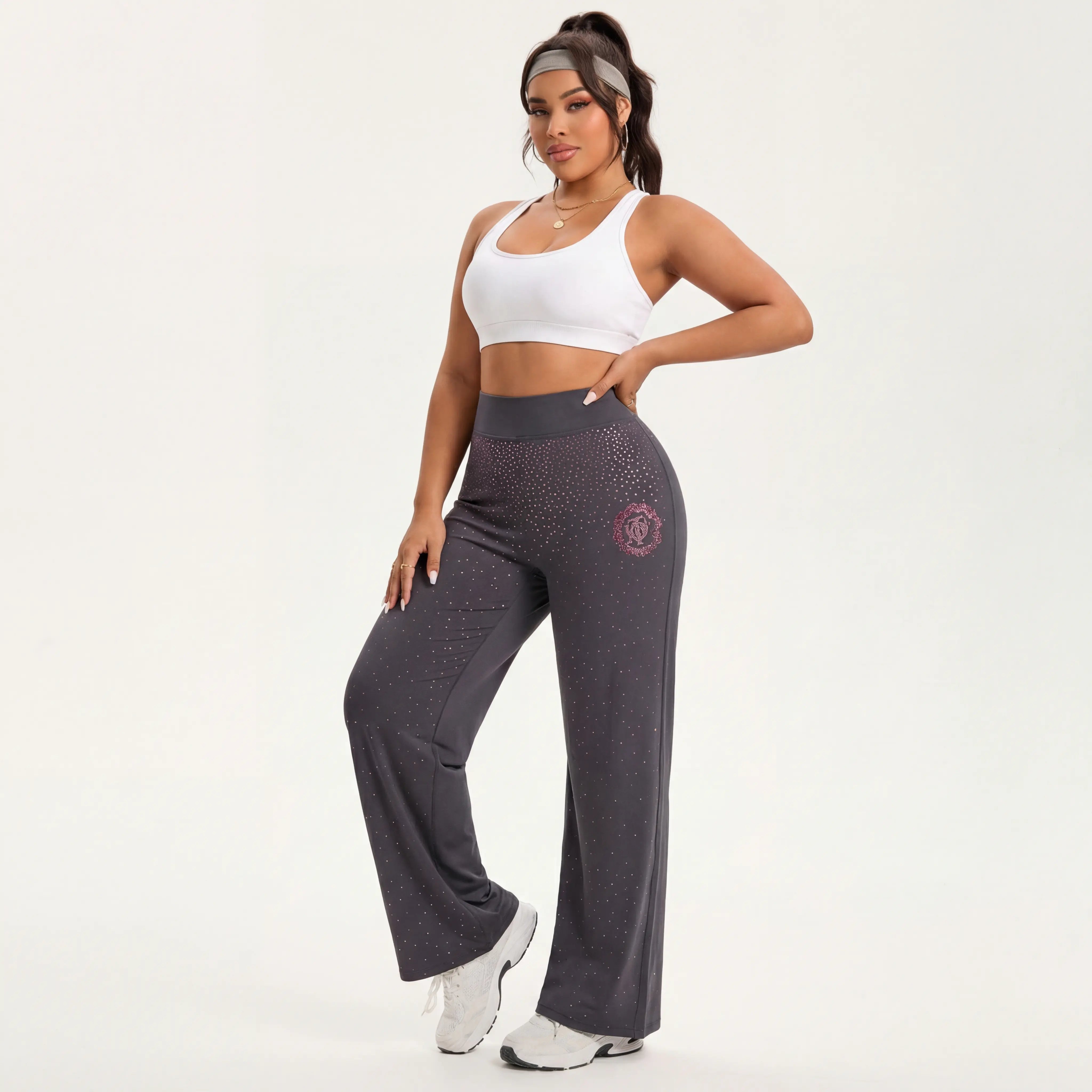 Woman wearing gray leggings with a logo on a white background, TCH Purple Rhinestone Gradient Sweatpants