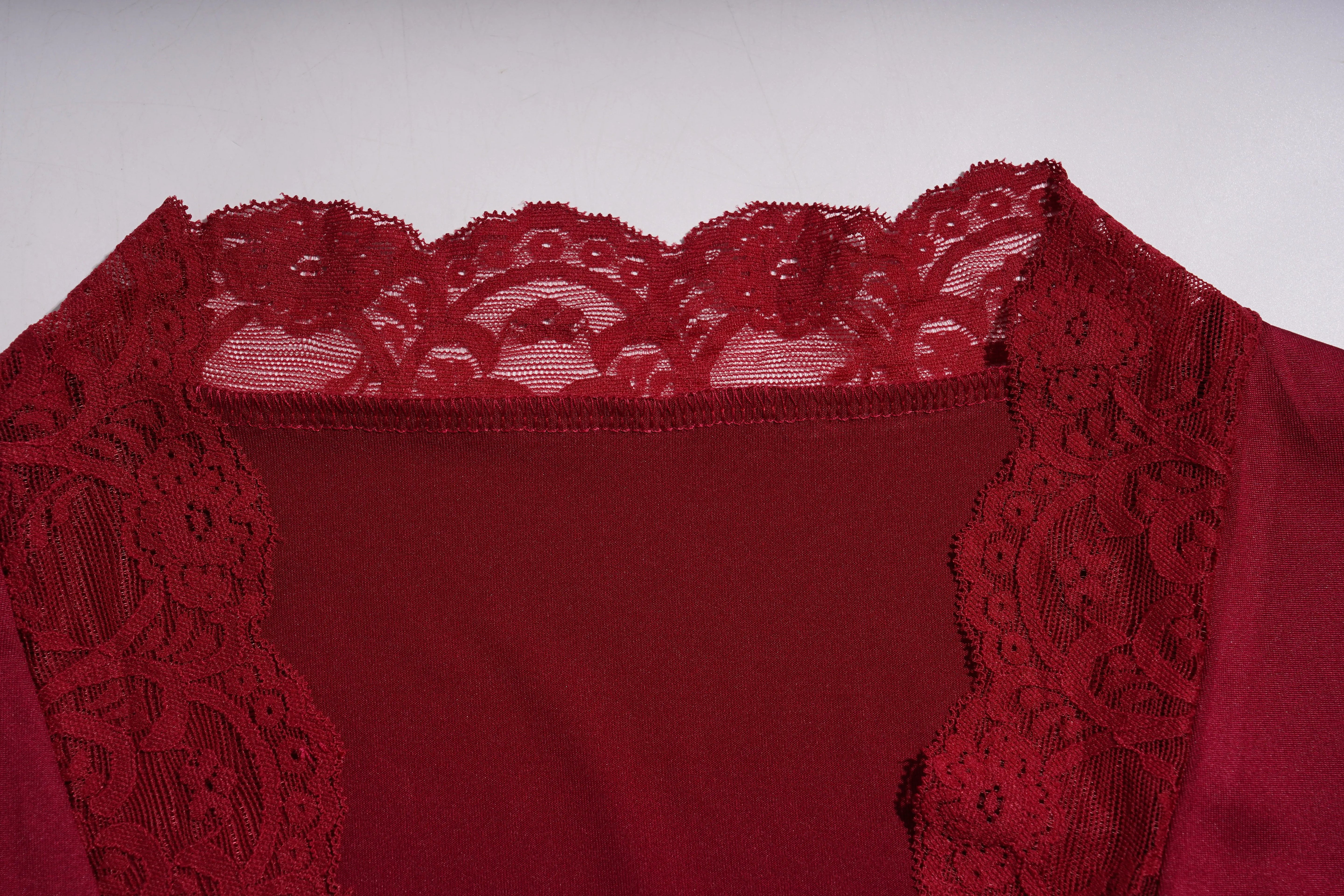 Red lace-trimmed garment on a white background, TCH Red Lace Trim V-Neck Long Rhinestone Wing Long Sleeve Top
