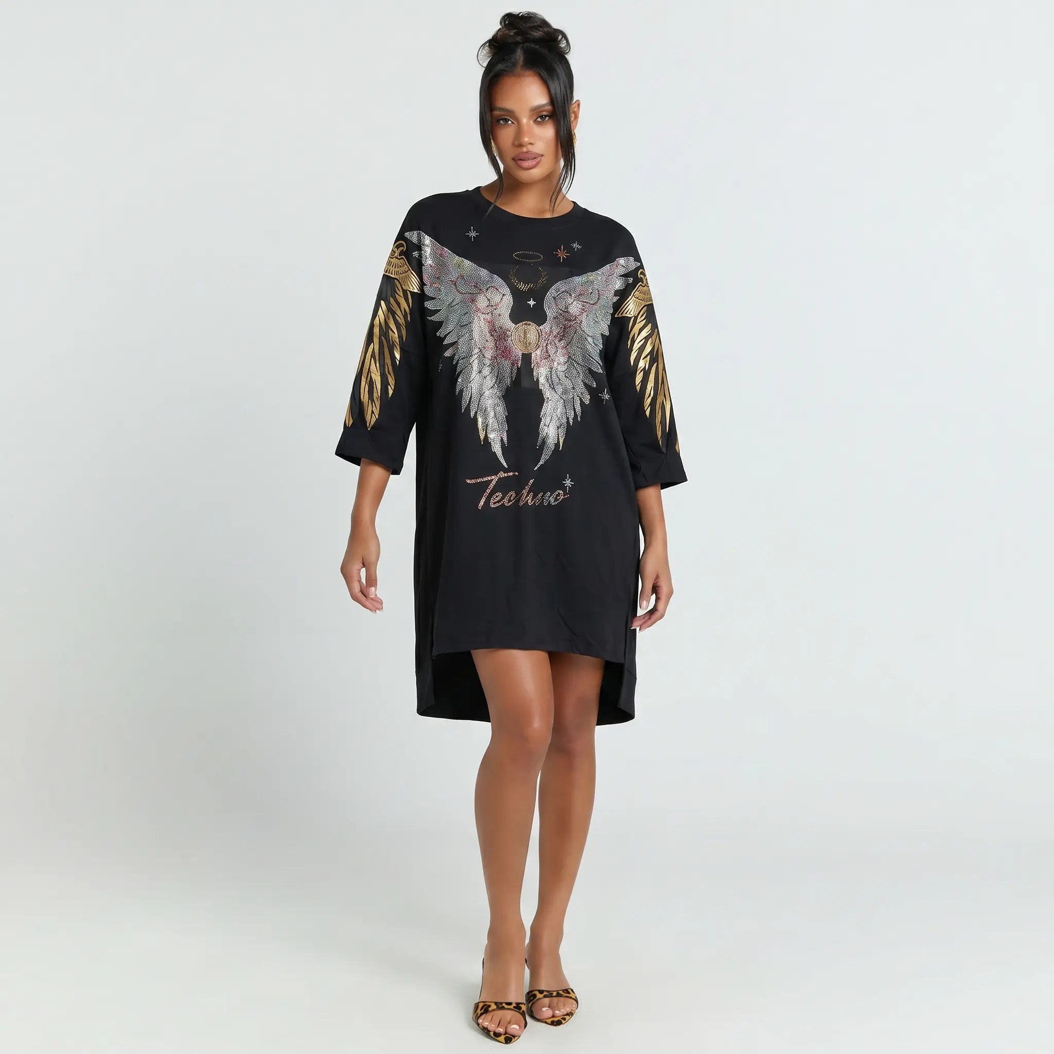 Woman wearing a black dress with angel wings and 'Techno' text on a white background, TCH Rhinestone Angel Wing Black Dress