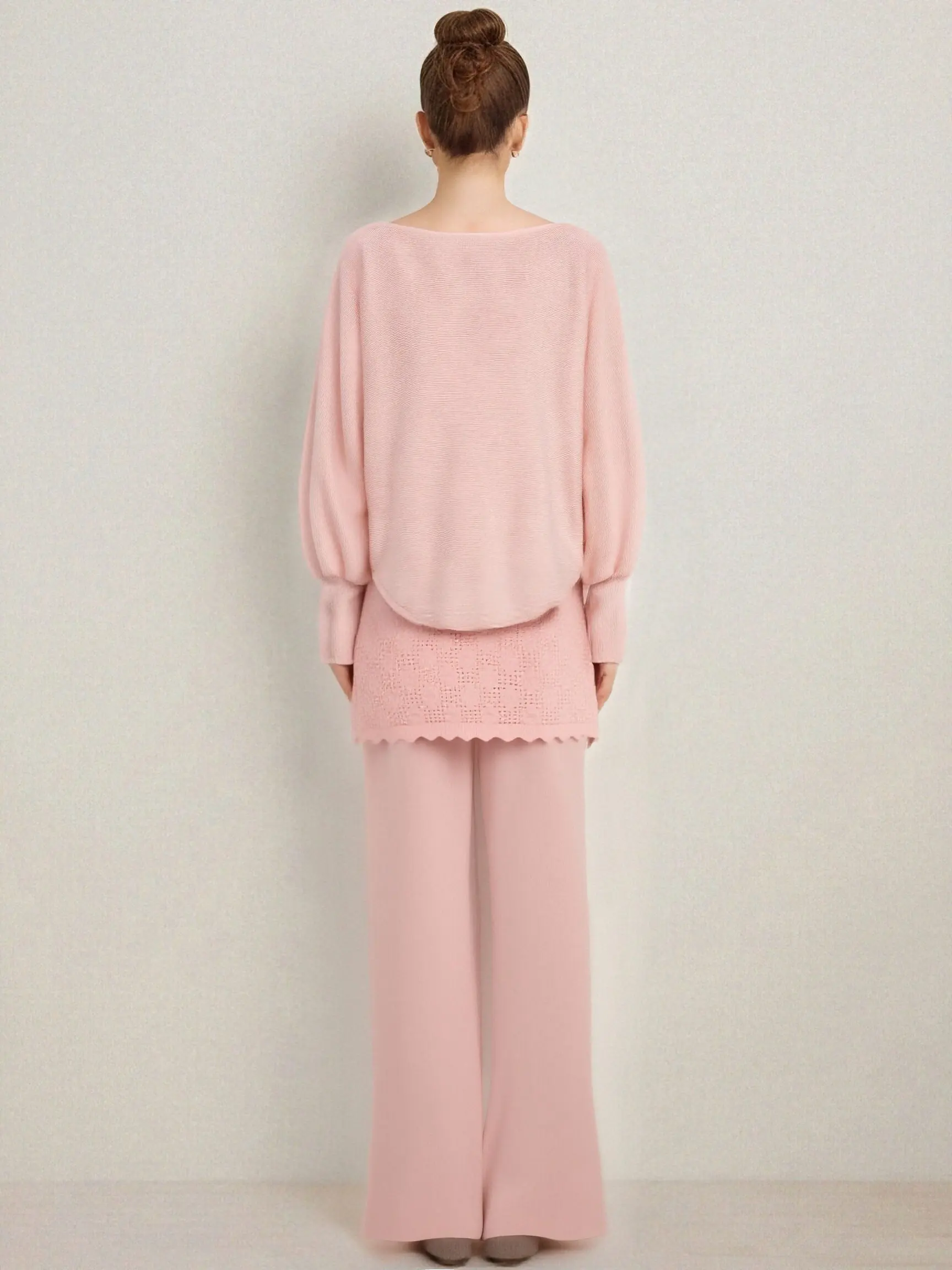 Person wearing a pink outfit with a plain background, TCH Rhinestone Angel Wings Layered Knit Top & Wide-Leg Pants Set