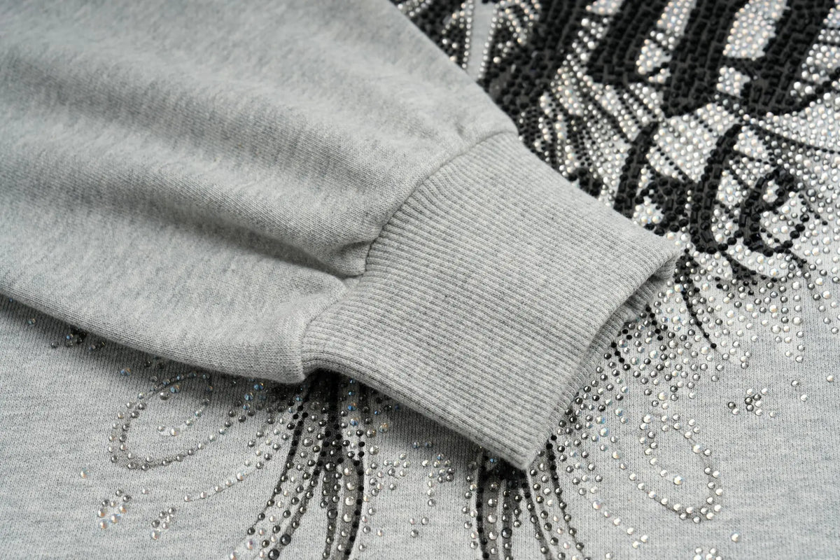 TCH Rhinestone Angel Wings Oversized Grey Sweatshirt TCH angel wings sweatshirt Grey rhinestone sweatshirt Oversized grey sweatshirt Angel wing graphic pullover Rhinestone embellished sweatshirt Black and white graphic sweatshirt Oversized streetwear sweatshirt Feather wing graphic top Y2K graphic sweatshirt Grey casual crewneck sweatshirt