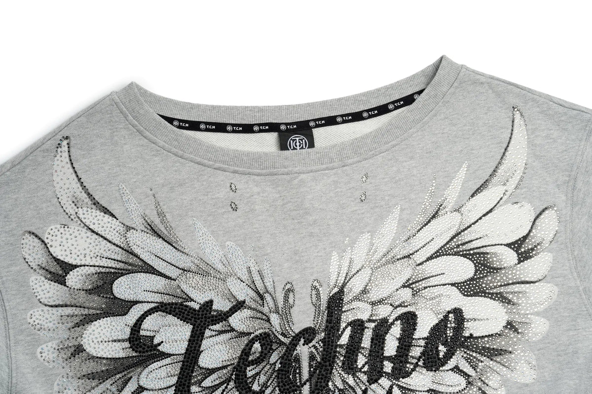 TCH Rhinestone Angel Wings Oversized Grey Sweatshirt TCH angel wings sweatshirt Grey rhinestone sweatshirt Oversized grey sweatshirt Angel wing graphic pullover Rhinestone embellished sweatshirt Black and white graphic sweatshirt Oversized streetwear sweatshirt Feather wing graphic top Y2K graphic sweatshirt Grey casual crewneck sweatshirt