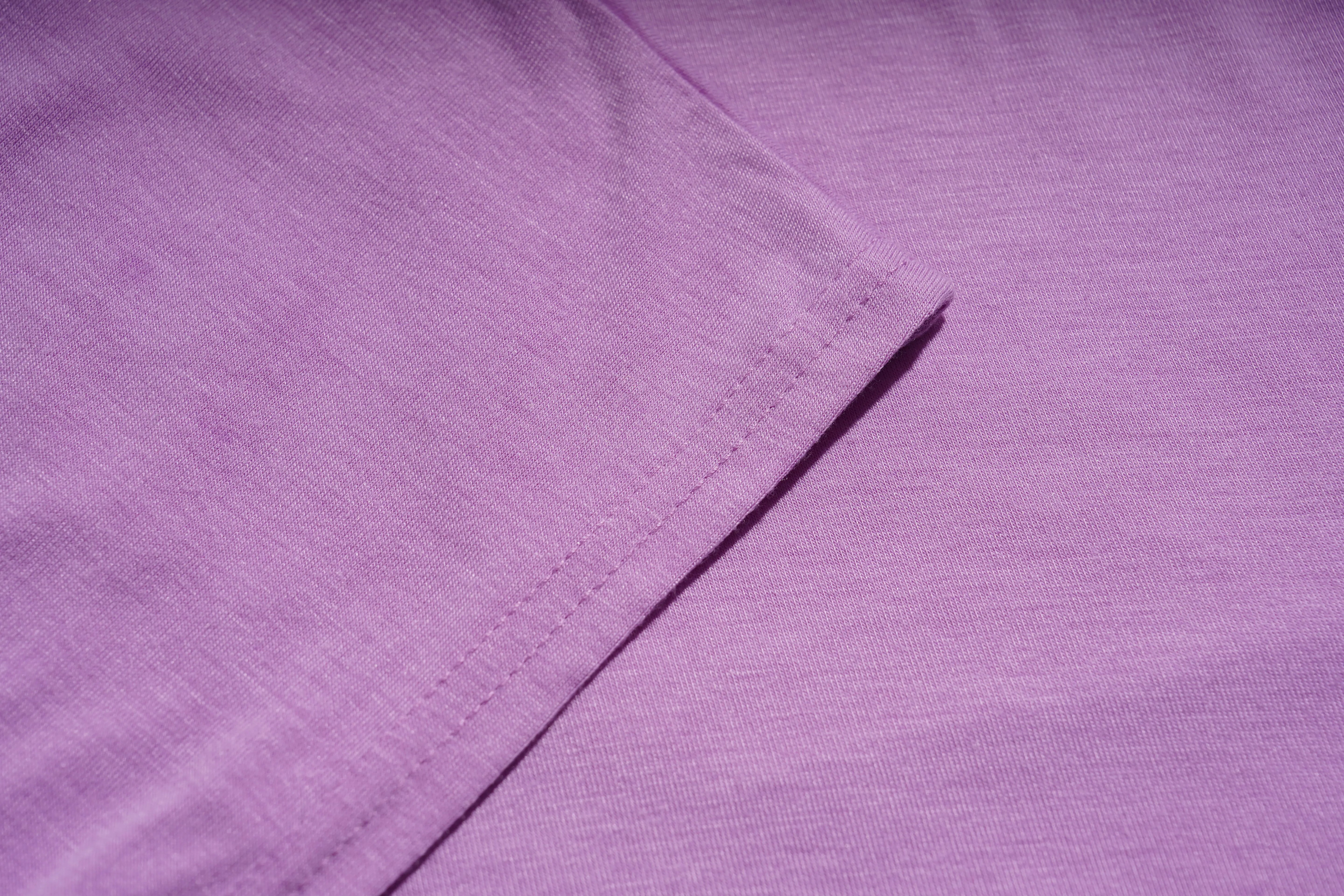 Close-up of a needle on purple fabric, TCH Rhinestone Angel Wings V-Neck T-Shirt