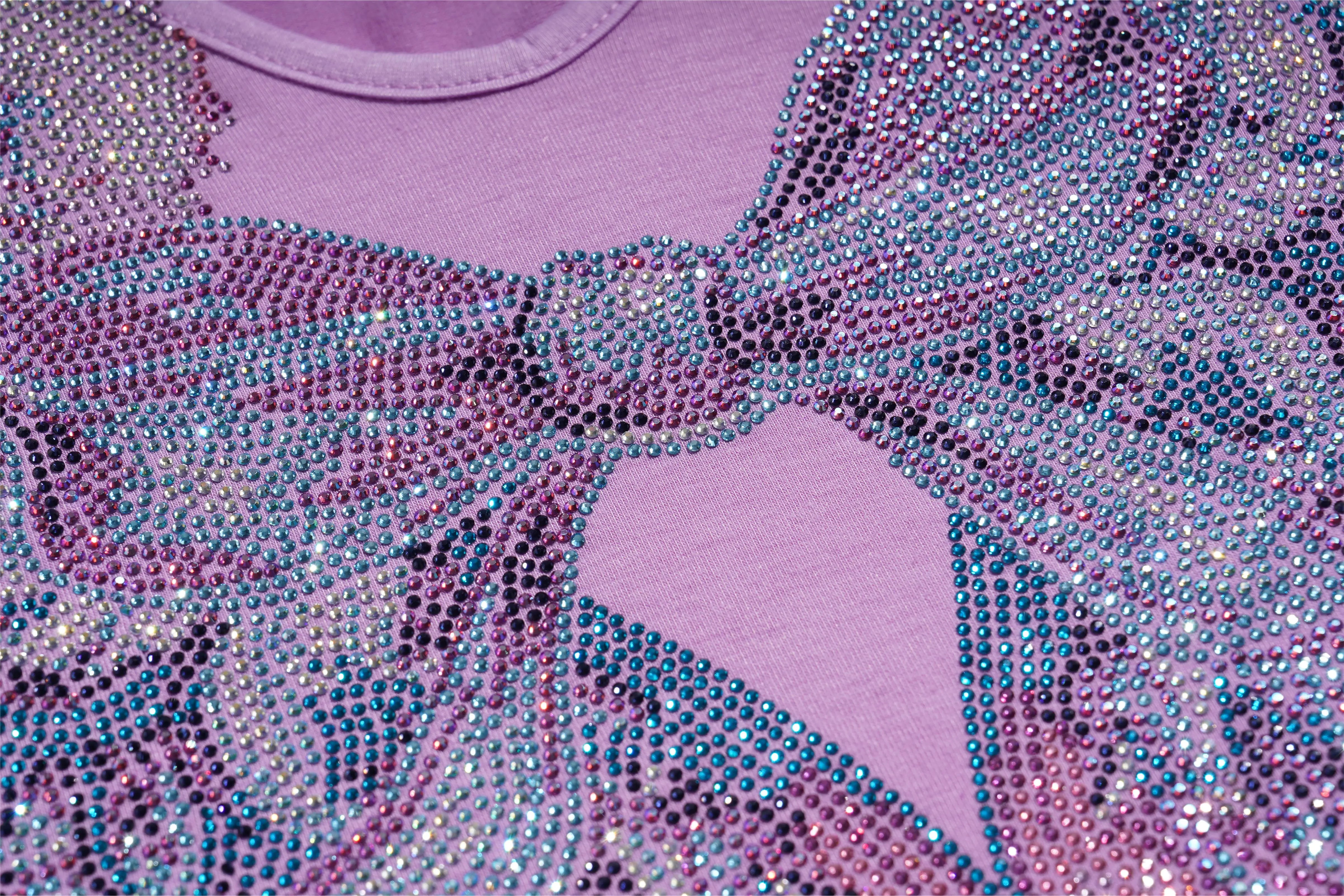 Close-up of a pink shirt with decorative rhinestone bow, TCH Rhinestone Angel Wings V-Neck T-Shirt