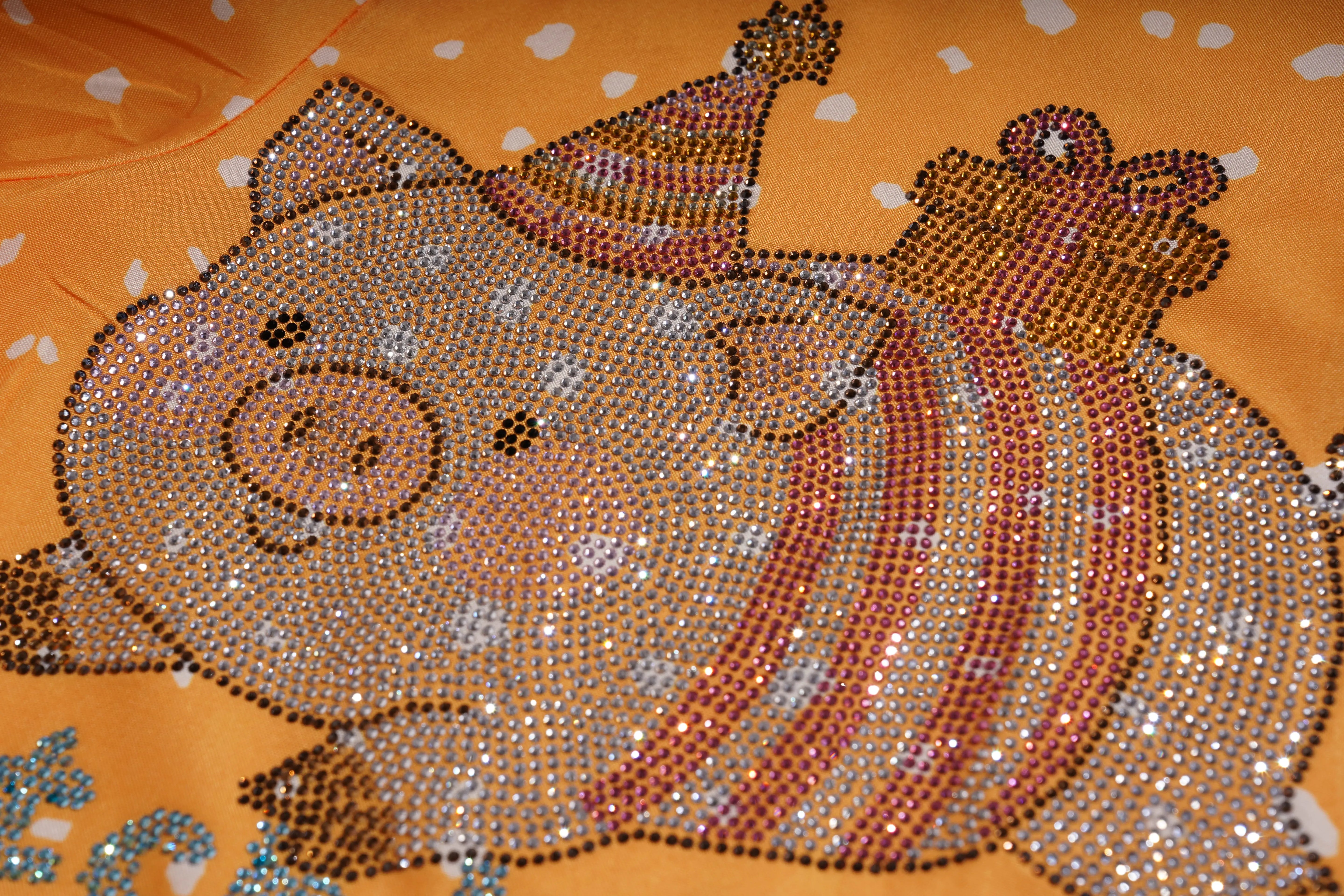 Decorative fabric with rhinestone-embellished pigs on an orange background, TCH Rhinestone Animal Polka Dot Shirt
