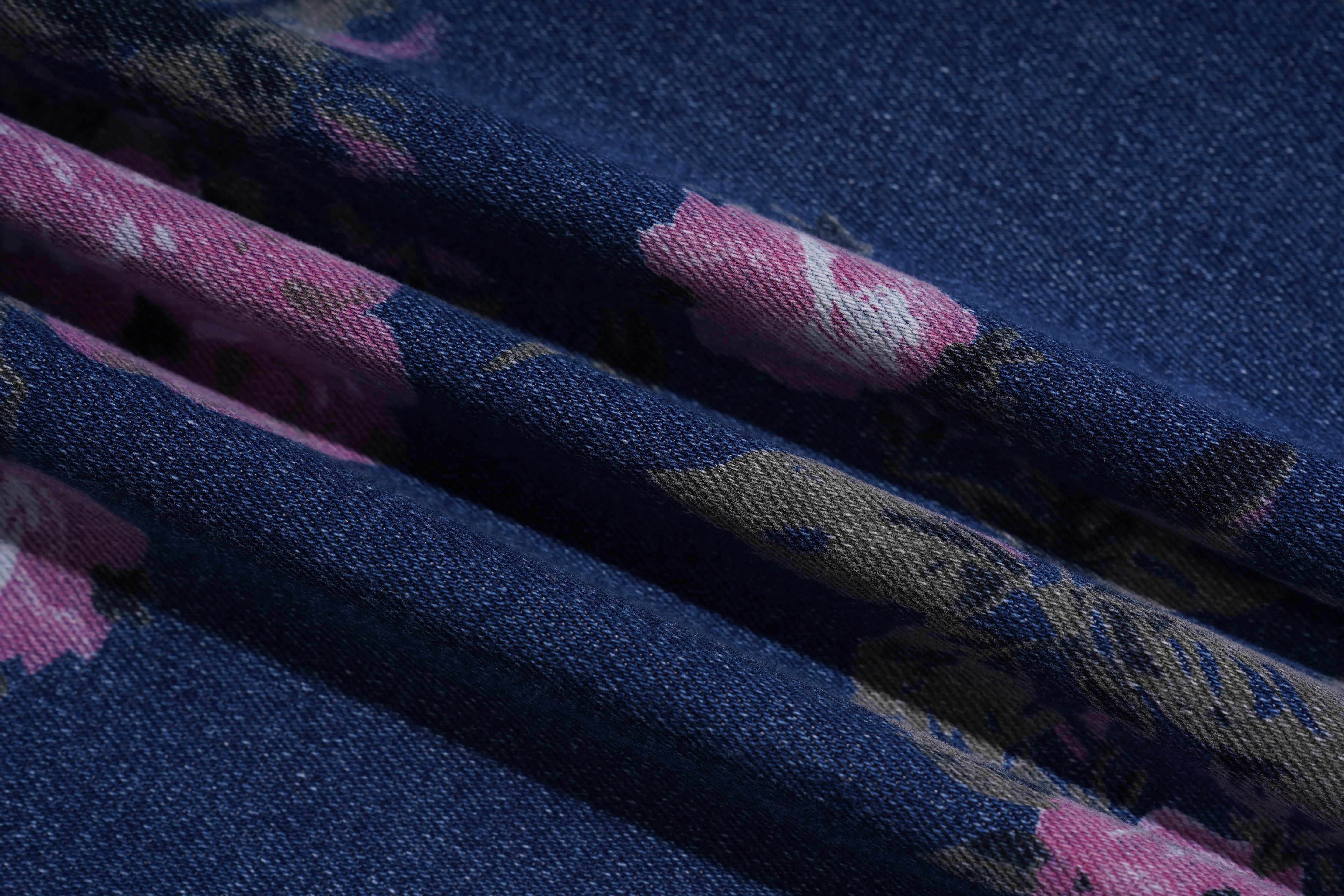 Close-up of fabric with pink floral pattern on a blue background, TCH Rhinestone Blossom Print Denim Jeans