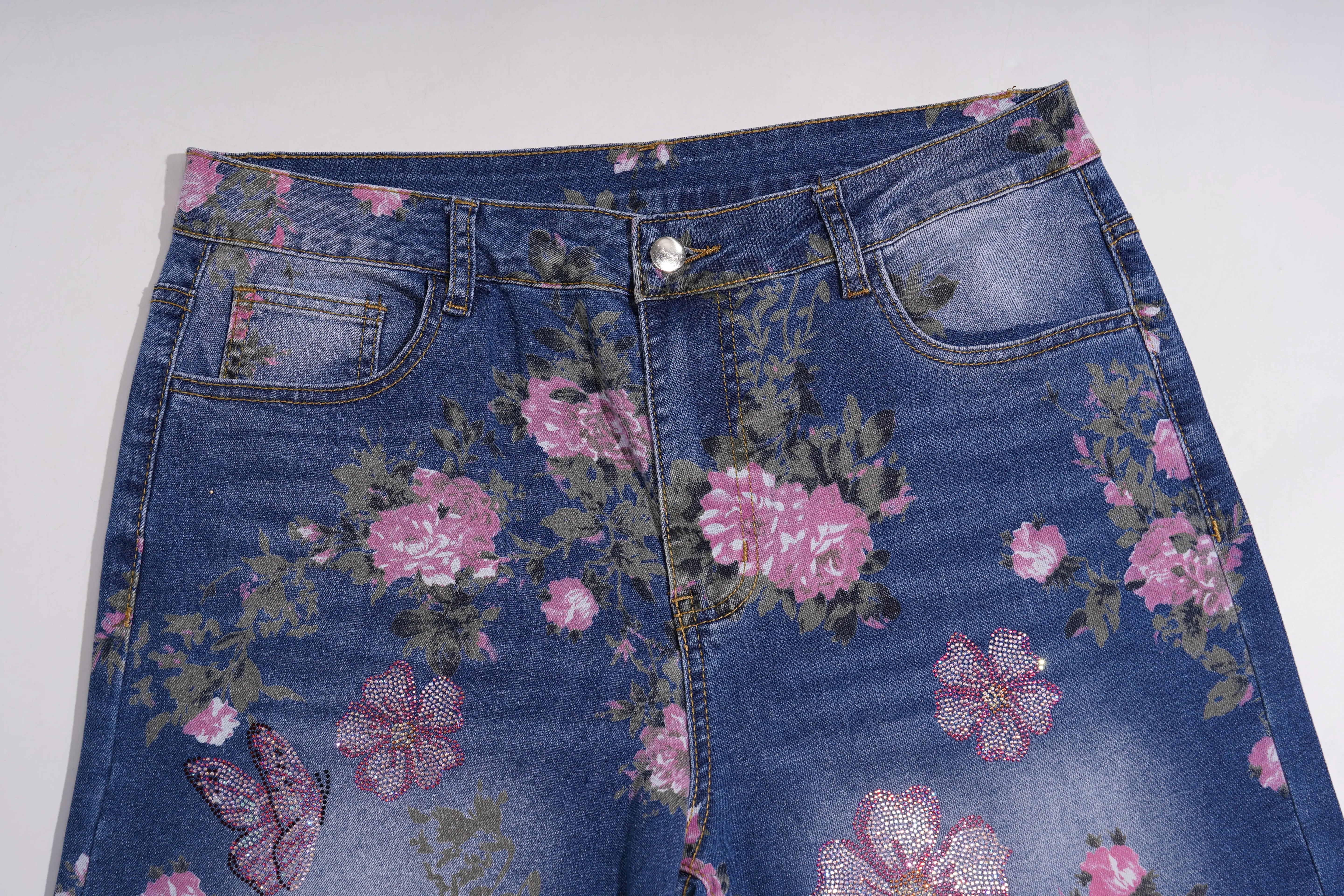 Floral-patterned denim shorts on a white background, TCH Rhinestone Blossom Print Denim Jeans