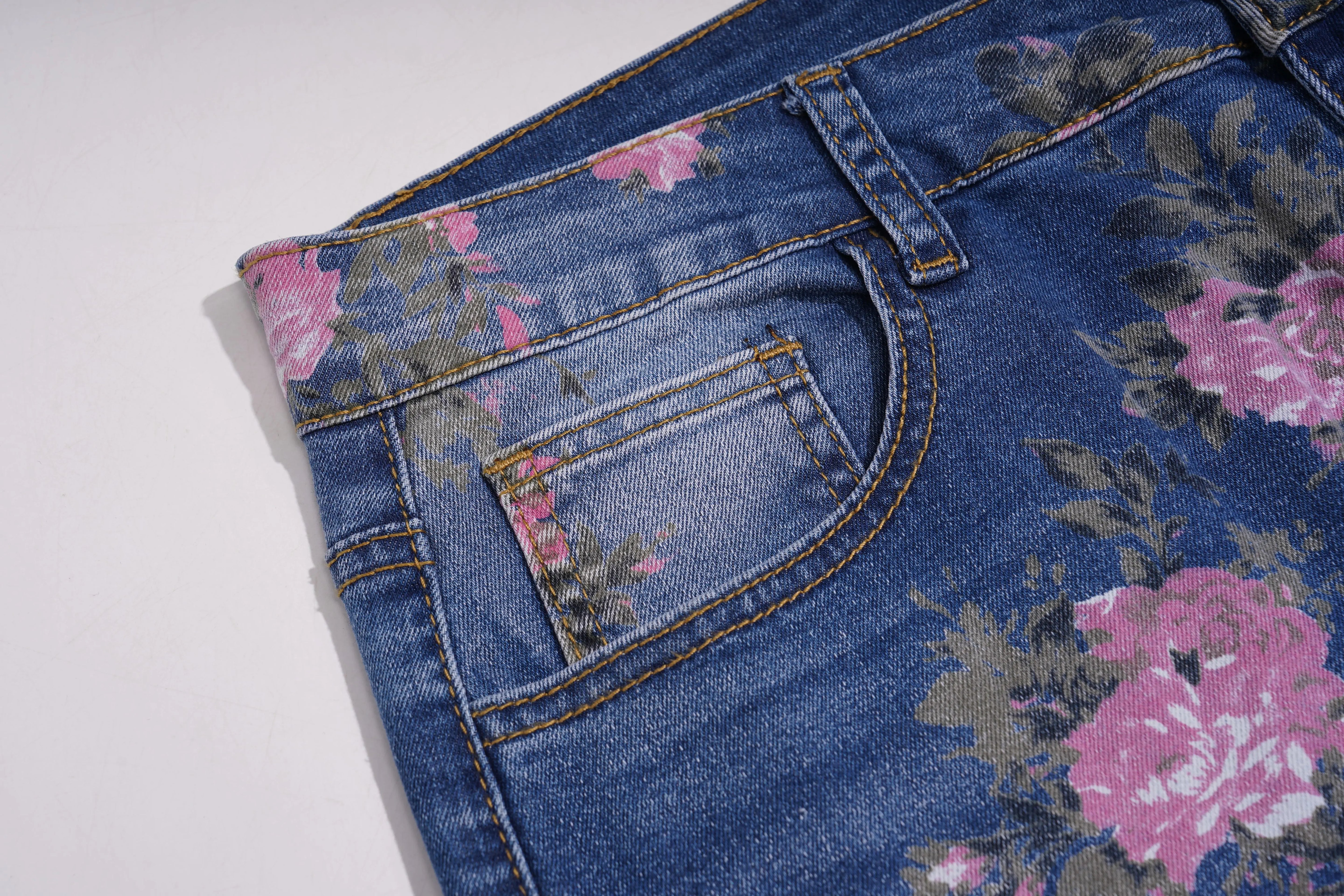 Blue jeans with floral patterns on a white background, TCH Rhinestone Blossom Print Denim Jeans