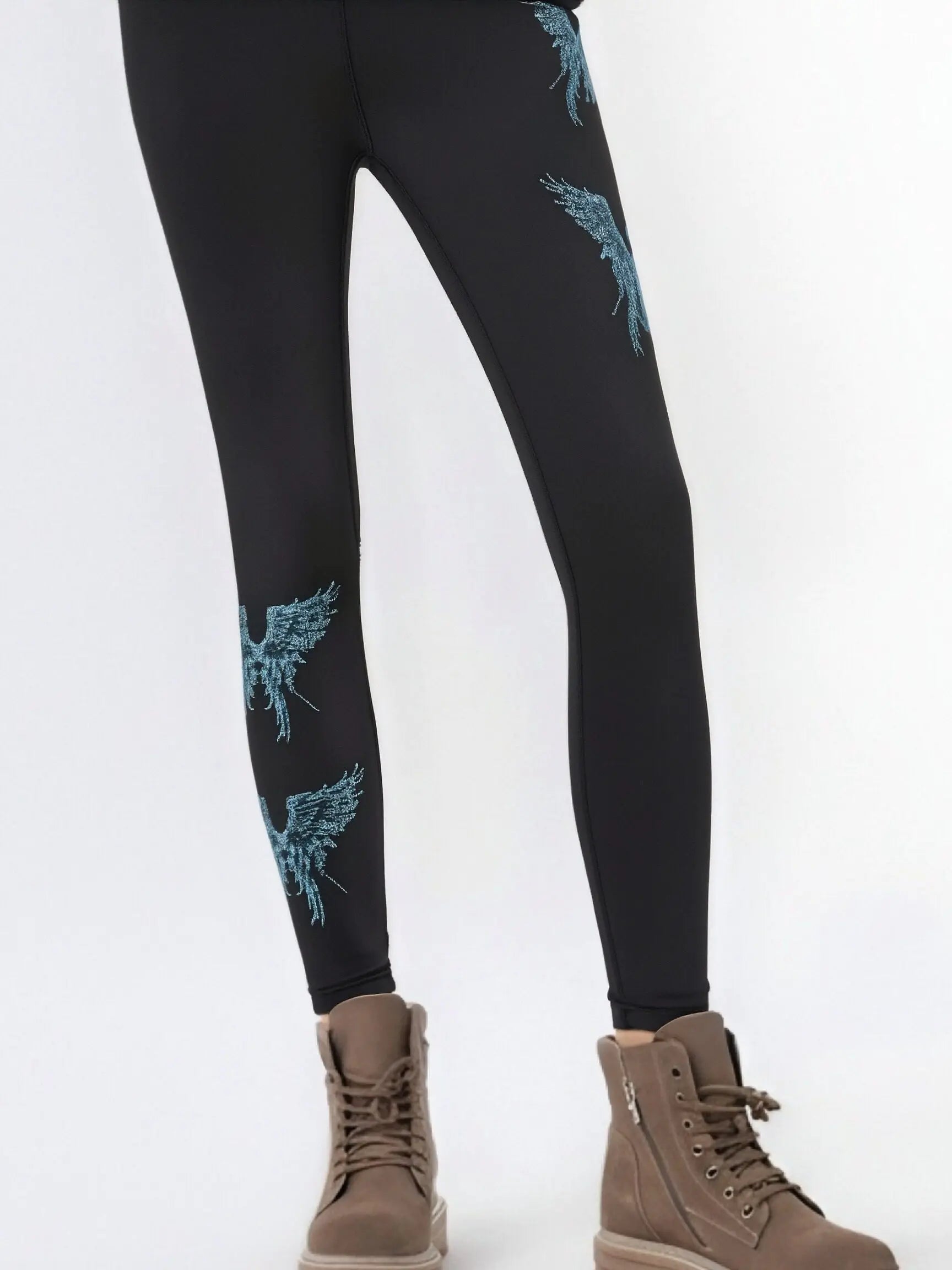 Black leggings with blue designs worn by a person on a white background, TCH Rhinestone Blue Wings Black High-Waist Leggings
