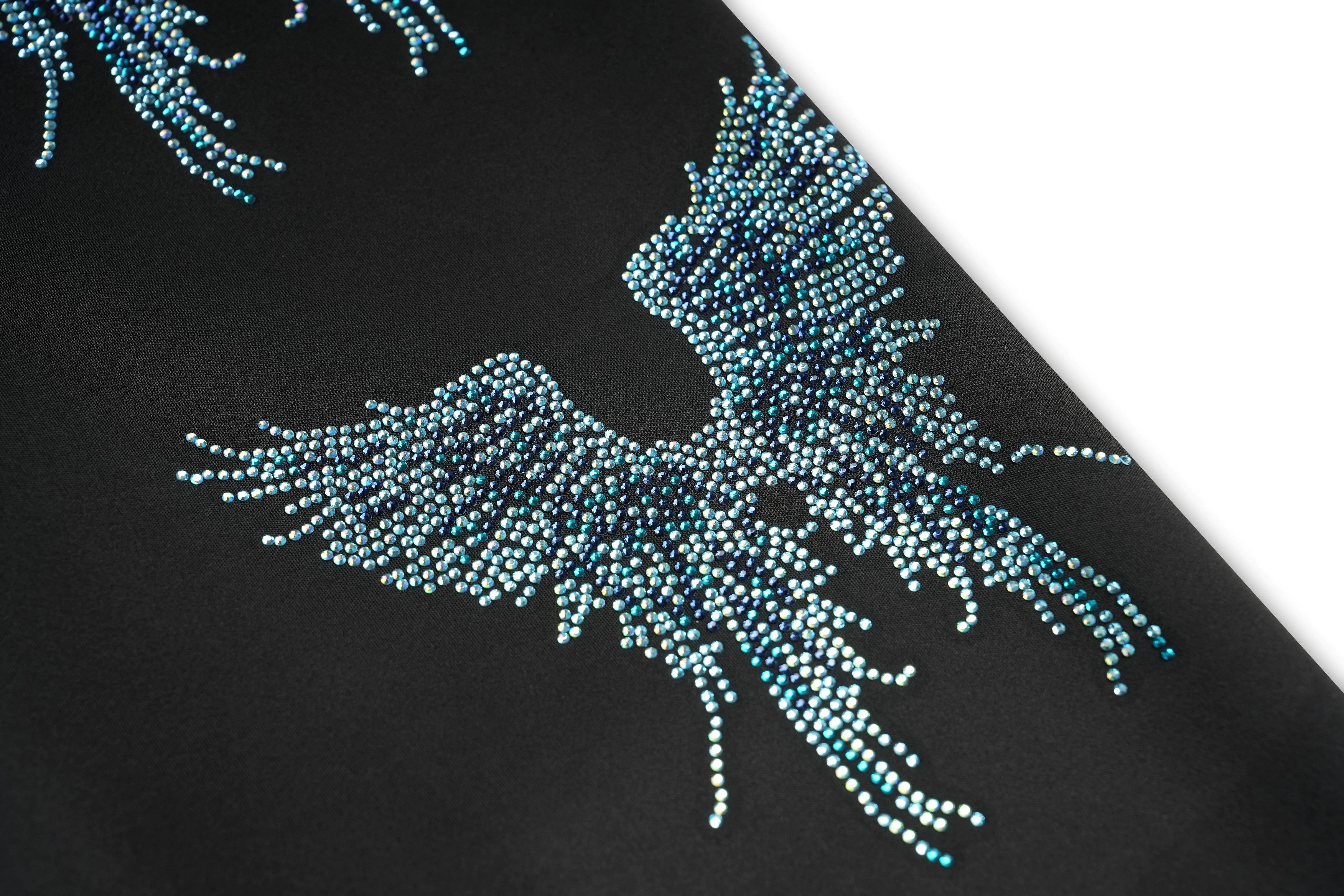 Close-up of a black fabric with teal beaded design on a white background, TCH Rhinestone Blue Wings Black High-Waist Leggings