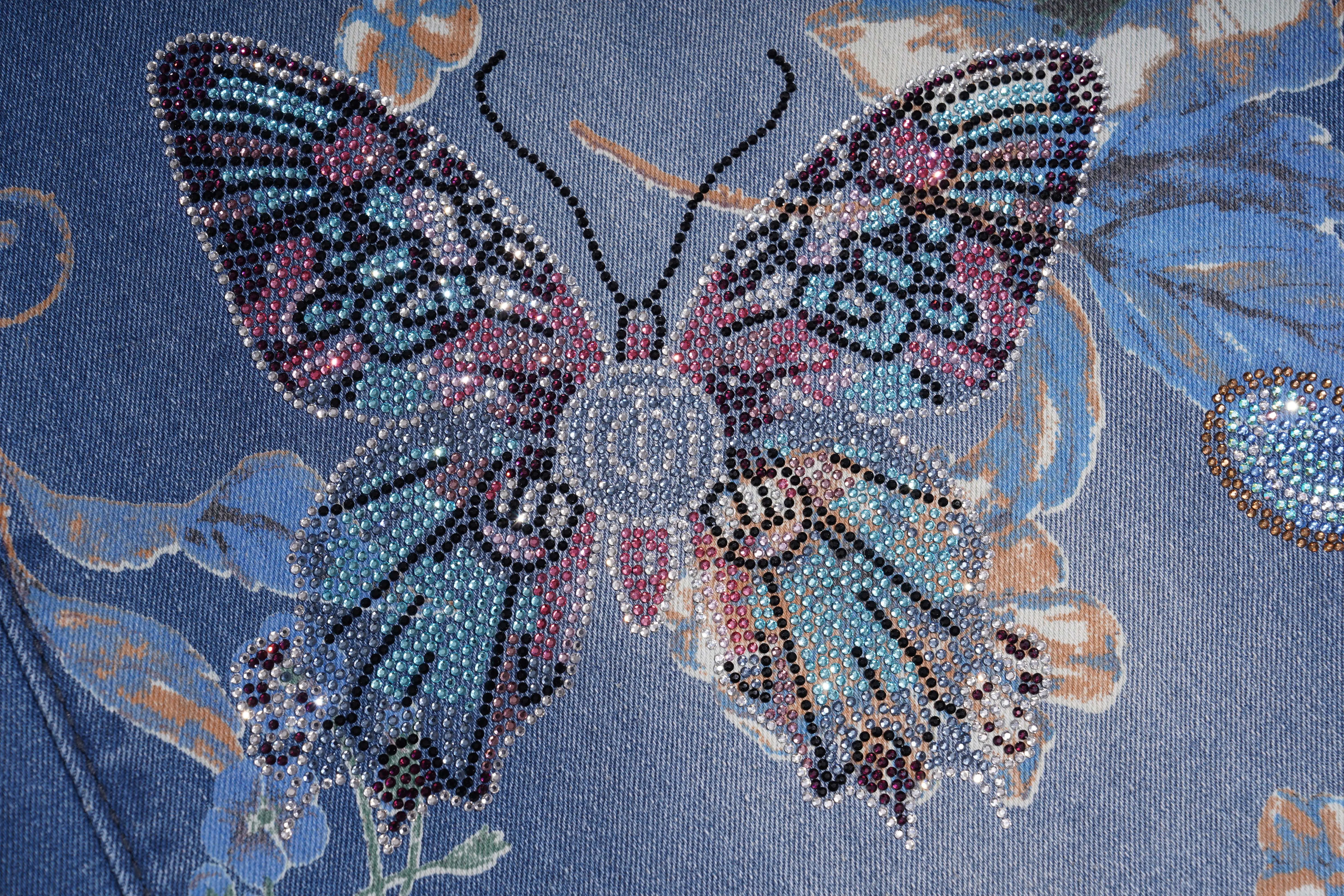Decorative fabric with butterfly pattern on a blue background, TCH Rhinestone Butterfly Floral Print Denim Jeans