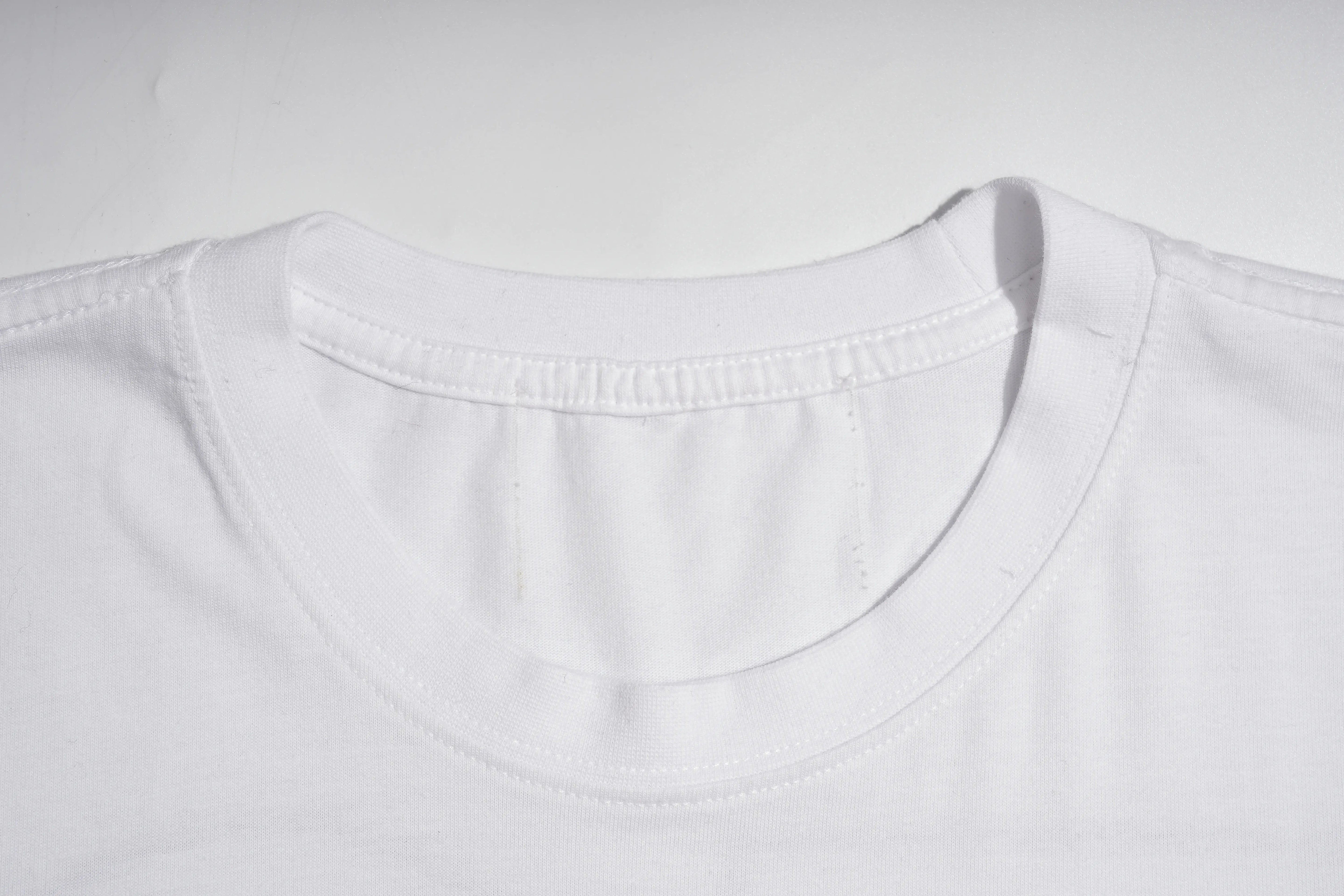 Close-up of a white crew-neck t-shirt showing the inner collar lining and stitching details against a plain white background. TCH Rhinestone Cartoon Pig Graphic Baseball T-Shirt