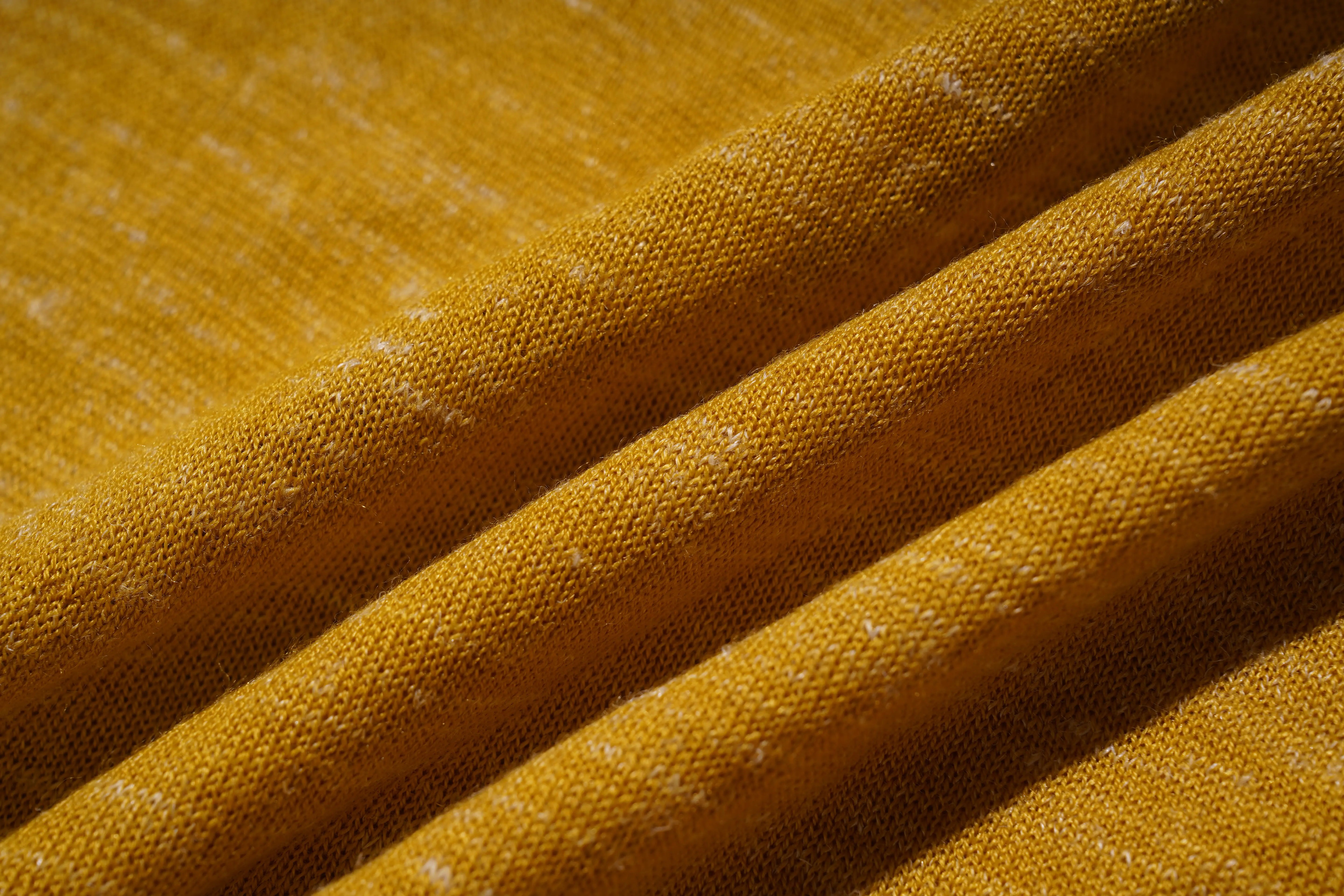 Close-up of yellow fabric with visible texture, TCH Rhinestone Chihuahua Galaxy Set