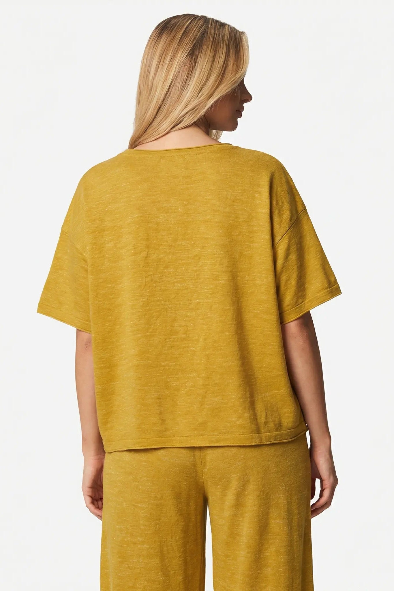 Person wearing a mustard yellow outfit on a white background. TCH Rhinestone Chihuahua Galaxy Set