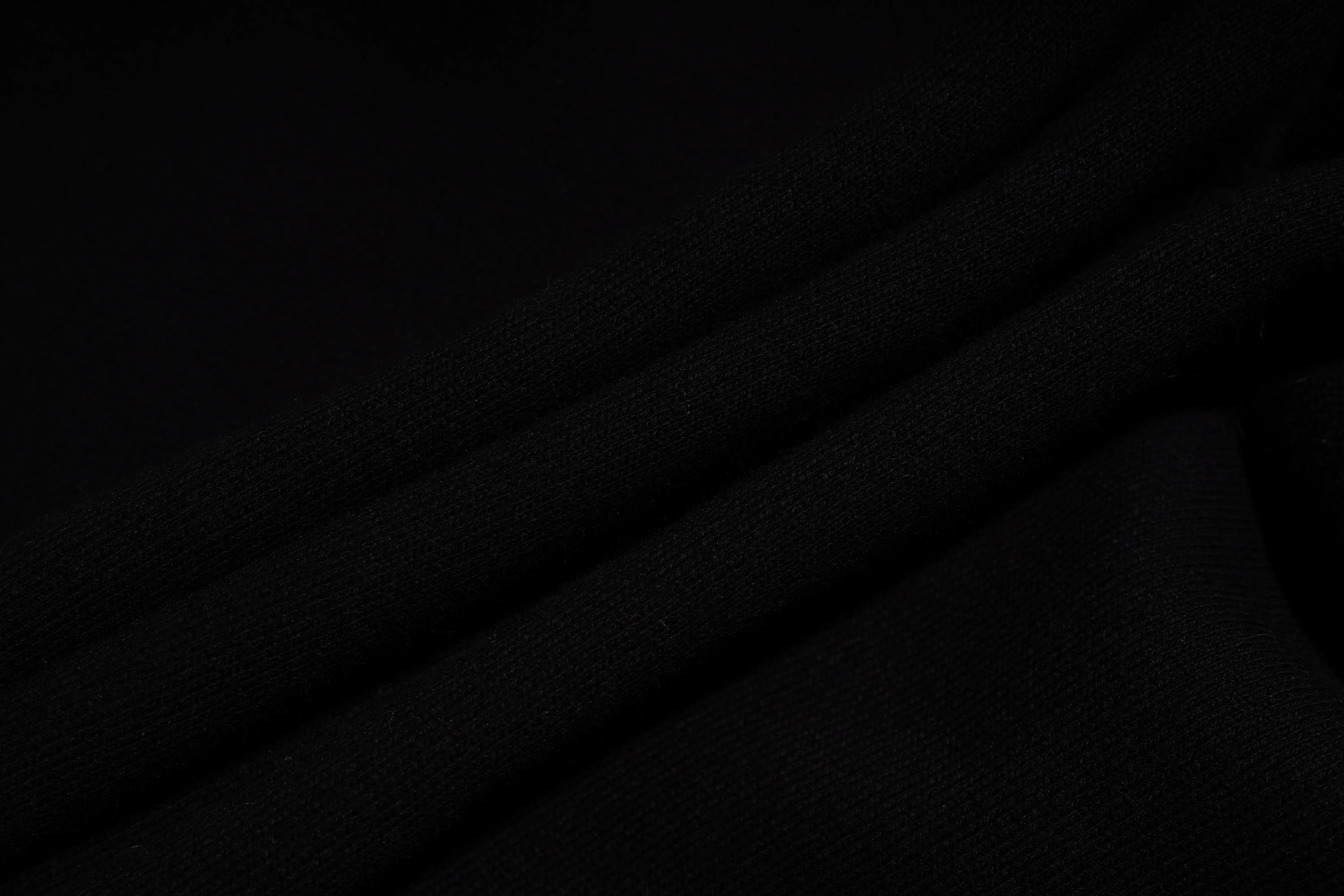 Dark textured background with subtle patterns