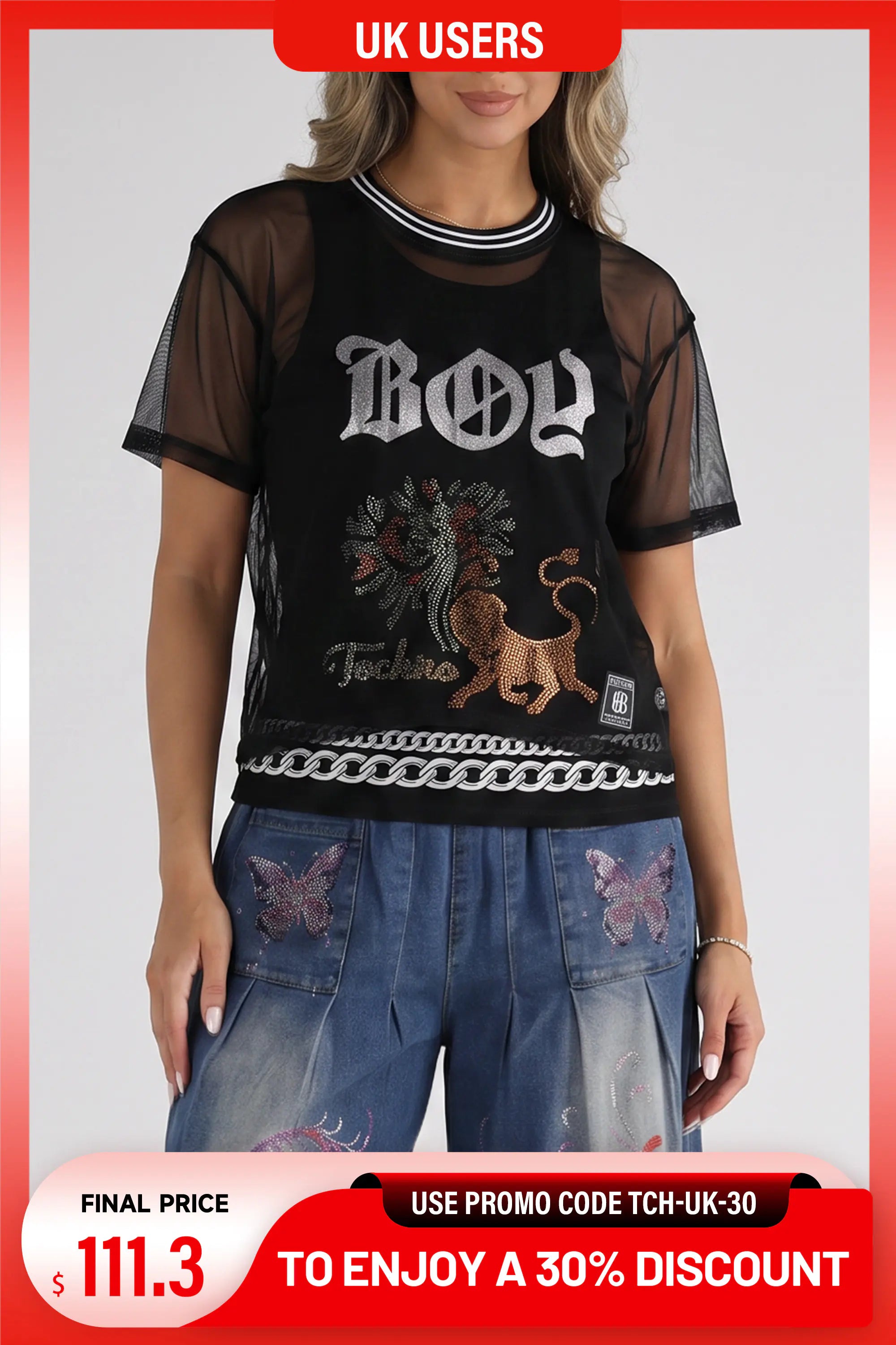 A woman wearing a black sheer mesh graphic T-shirt with 'BOY' in white gothic lettering, a lion and floral design, and a silver chain print, paired with blue jeans. The image has promotional overlays including 'UK USERS' and a discount banner. TCH Rhinestone Deer Graphic Mesh Sleeve Black Streetwear T-Shirt