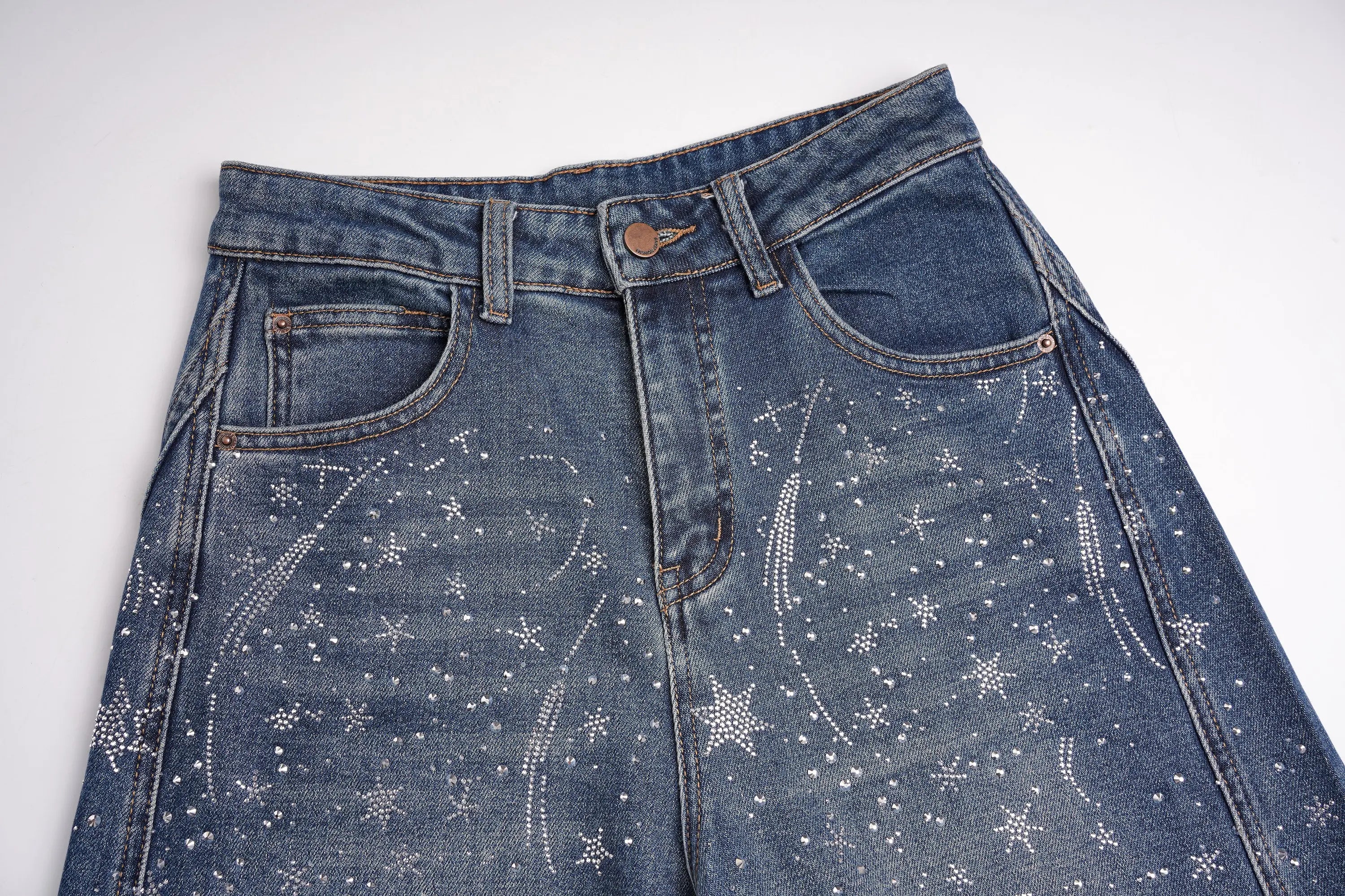Blue jeans with star pattern on a white background, TCH Rhinestone Galaxy Sparkle Wide-Leg Jeans