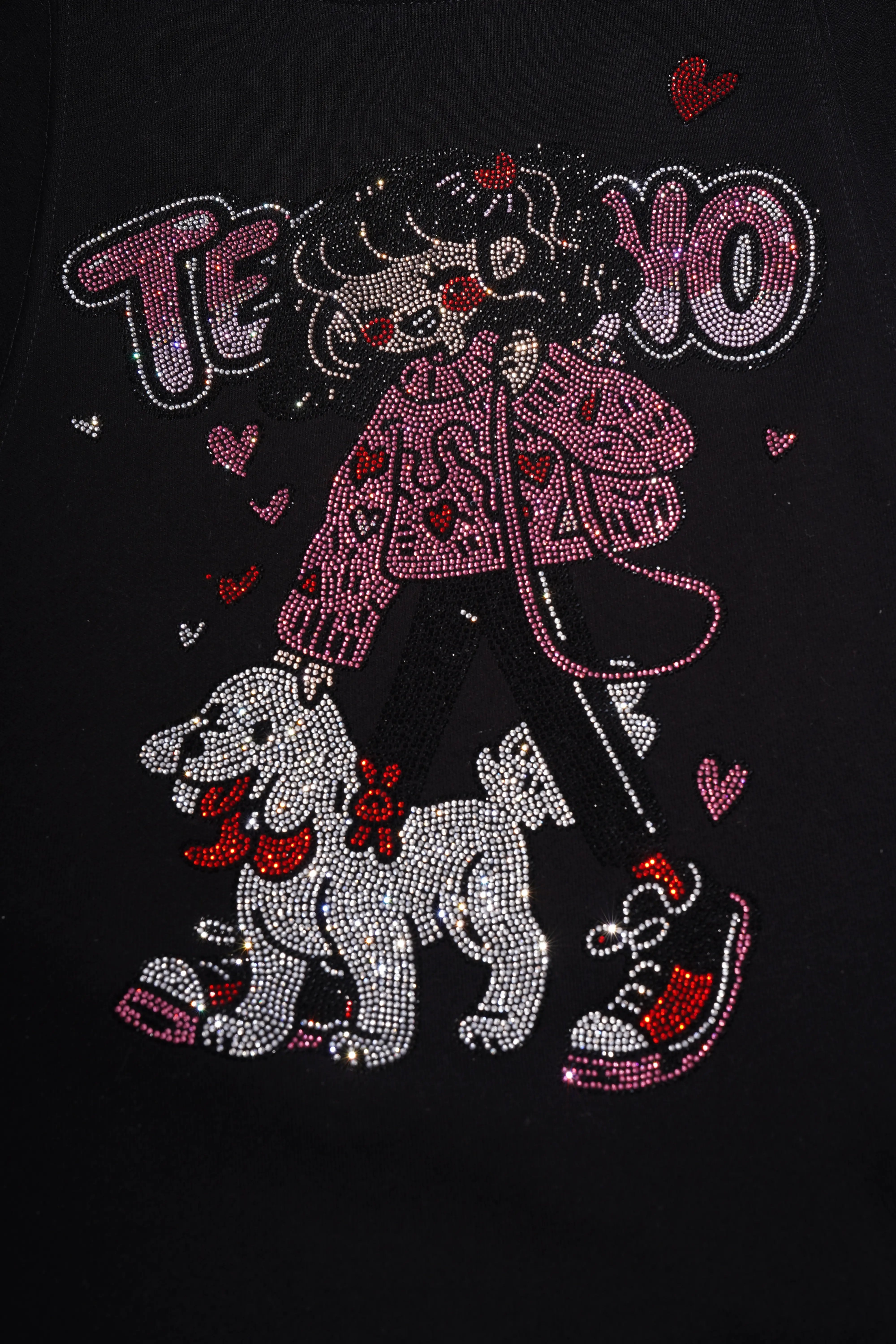 Embroidered design of a person with a dog and text on a black background, TCH Rhinestone Girl & Dog Graphic Crewneck Sweatshirt