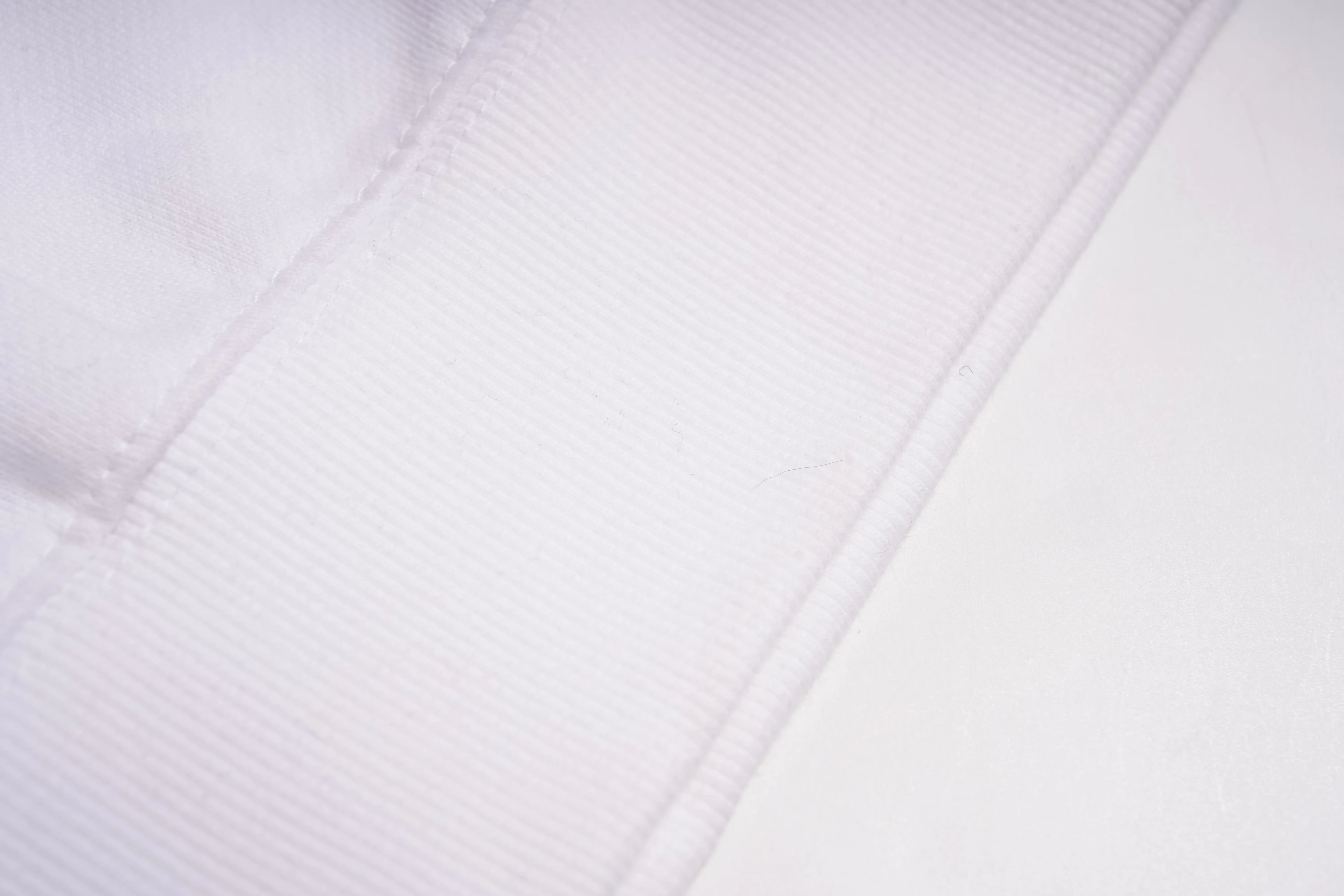 Close-up of white fabric texture, TCH Rhinestone Hello Kitty BOYLONDON Sweatshirt