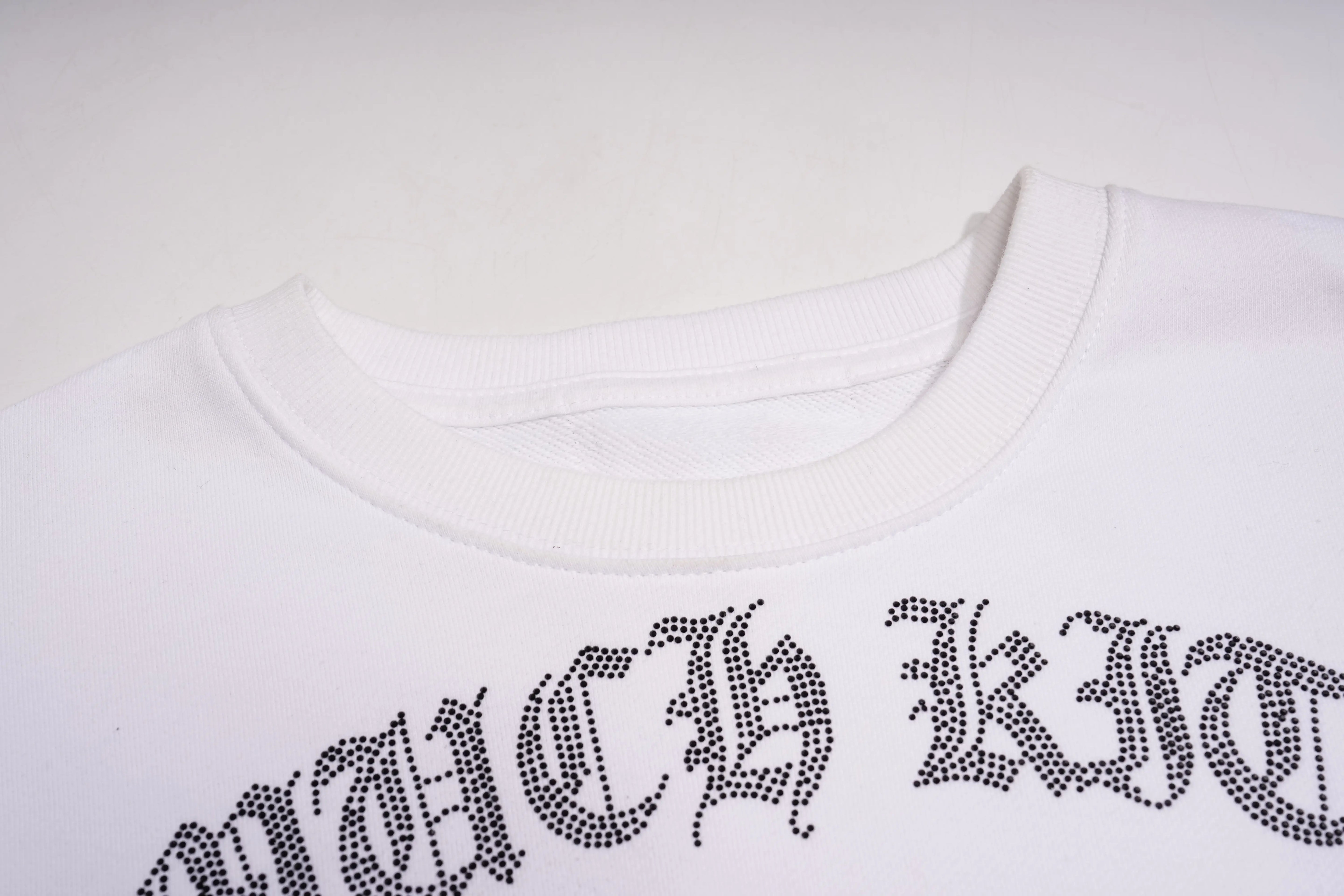 White sweatshirt with 'Witch King' text in rhinestone letters on a white background, TCH Rhinestone Hello Kitty BOYLONDON Sweatshirt