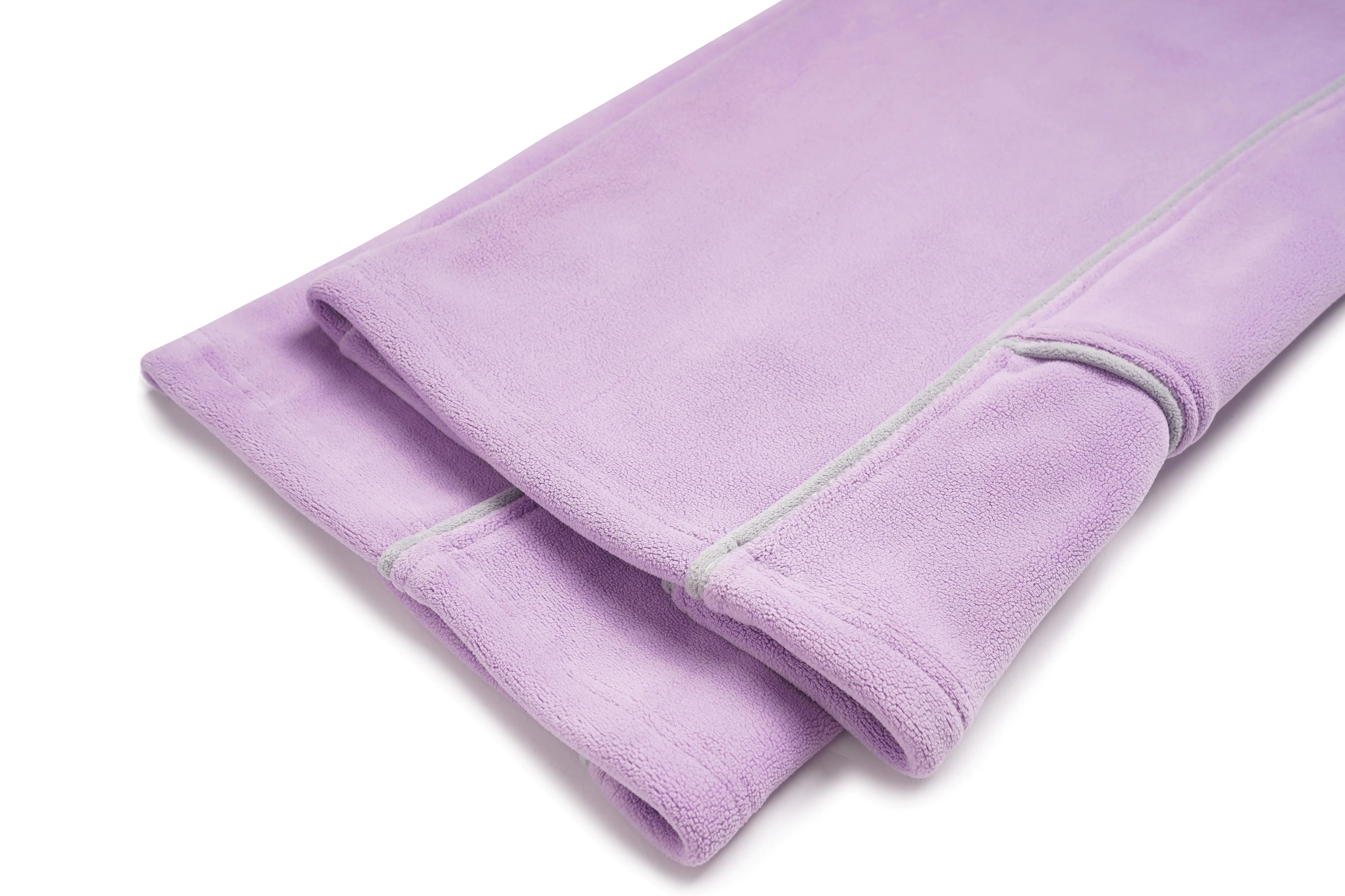 Folded purple towel on a white background, TCH Rhinestone Laundry Line Purple Zip Turtleneck Set