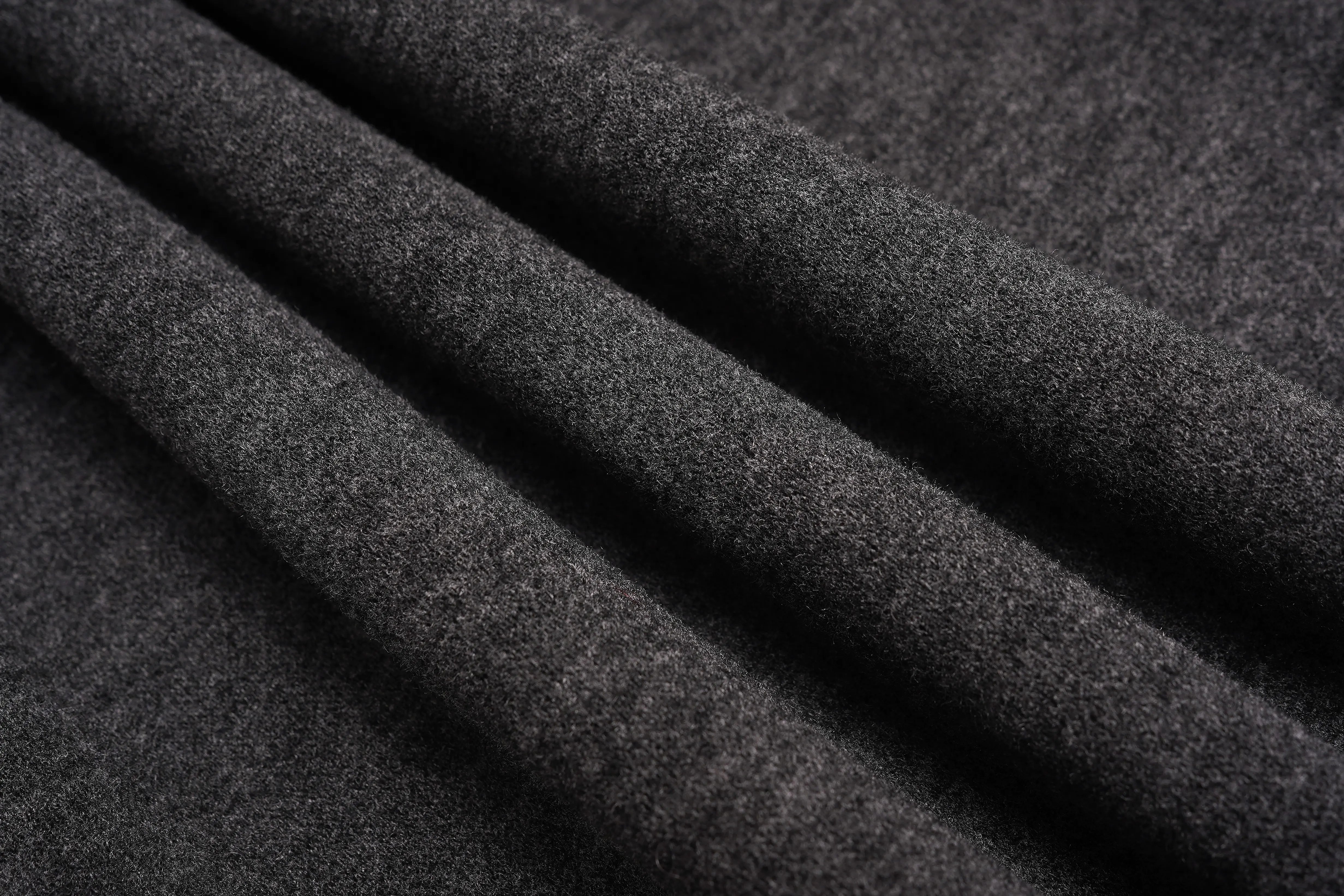 Close-up of dark gray fabric with folds, TCH Rhinestone New Year Logo Teddy Bear Grey Jogger Pants