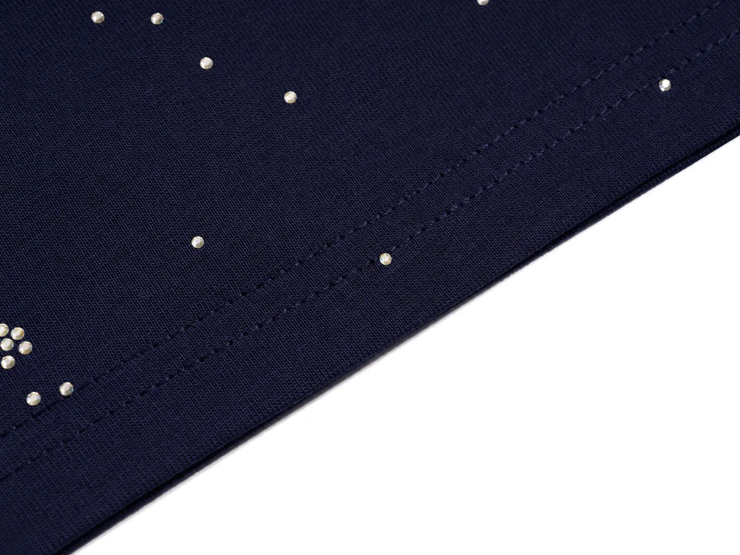 Close-up of a dark navy fabric with small metallic stud embellishments and a diagonal seam on a white background. TCH Rhinestone Pegasus Wing Graphic Navy Blue T-Shirt