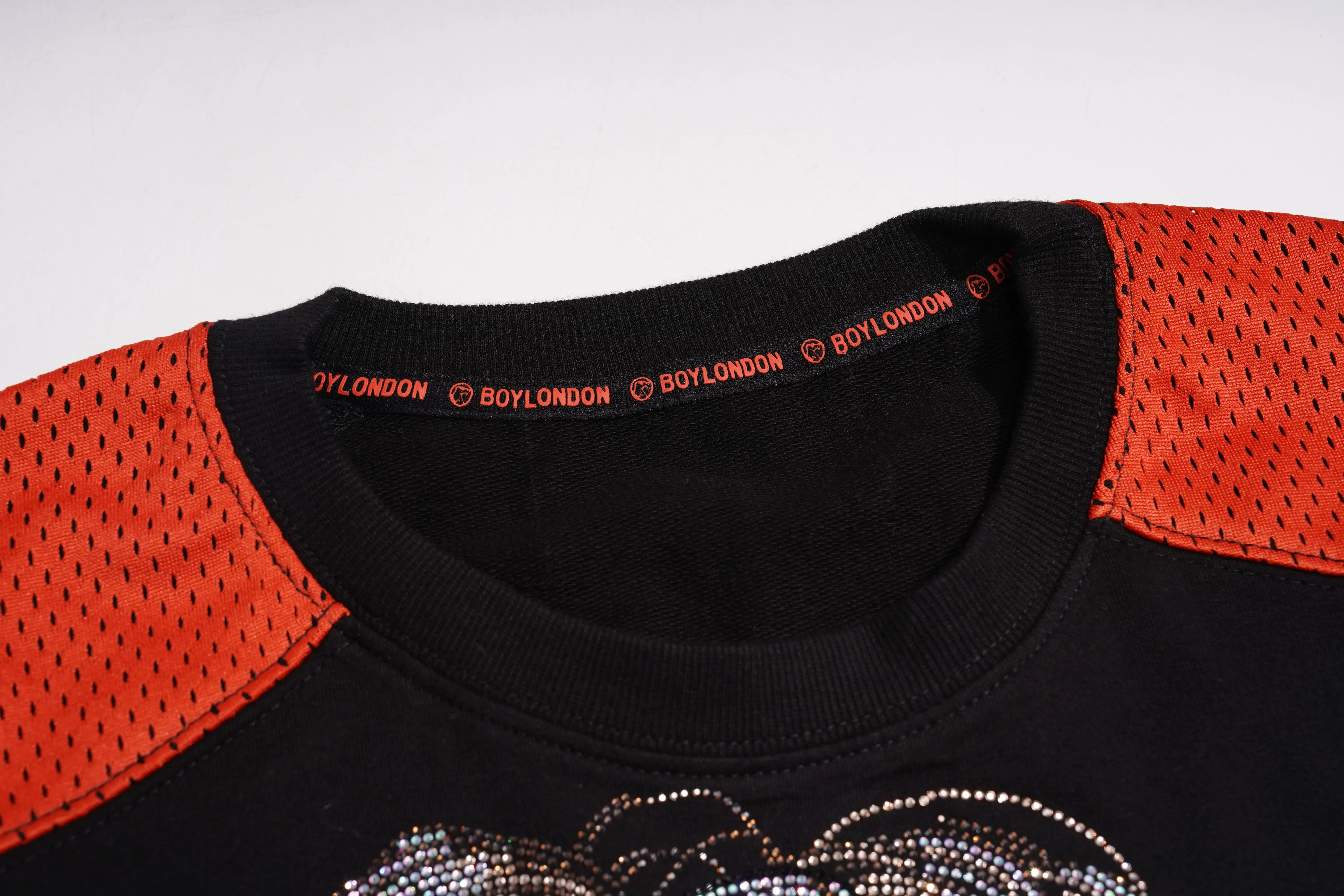 Black and red sports jersey with 'BOYLONDON' branding on a white background, TCH Rhinestone Rabbit Black Red Jersey