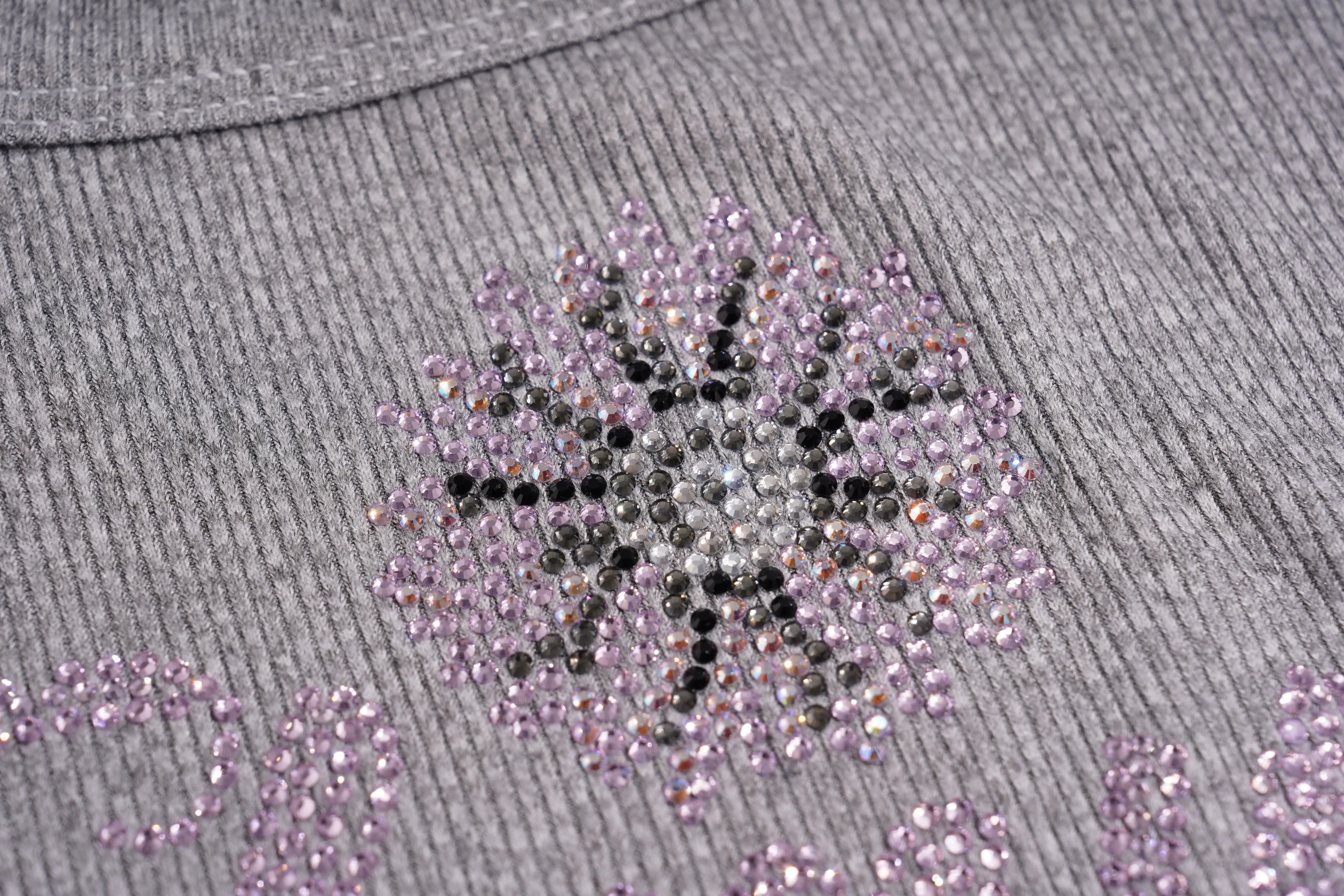 Gray fabric with pink rhinestone embellishments forming a decorative pattern, TCH Rhinestone Signature Ribbed Tank Top