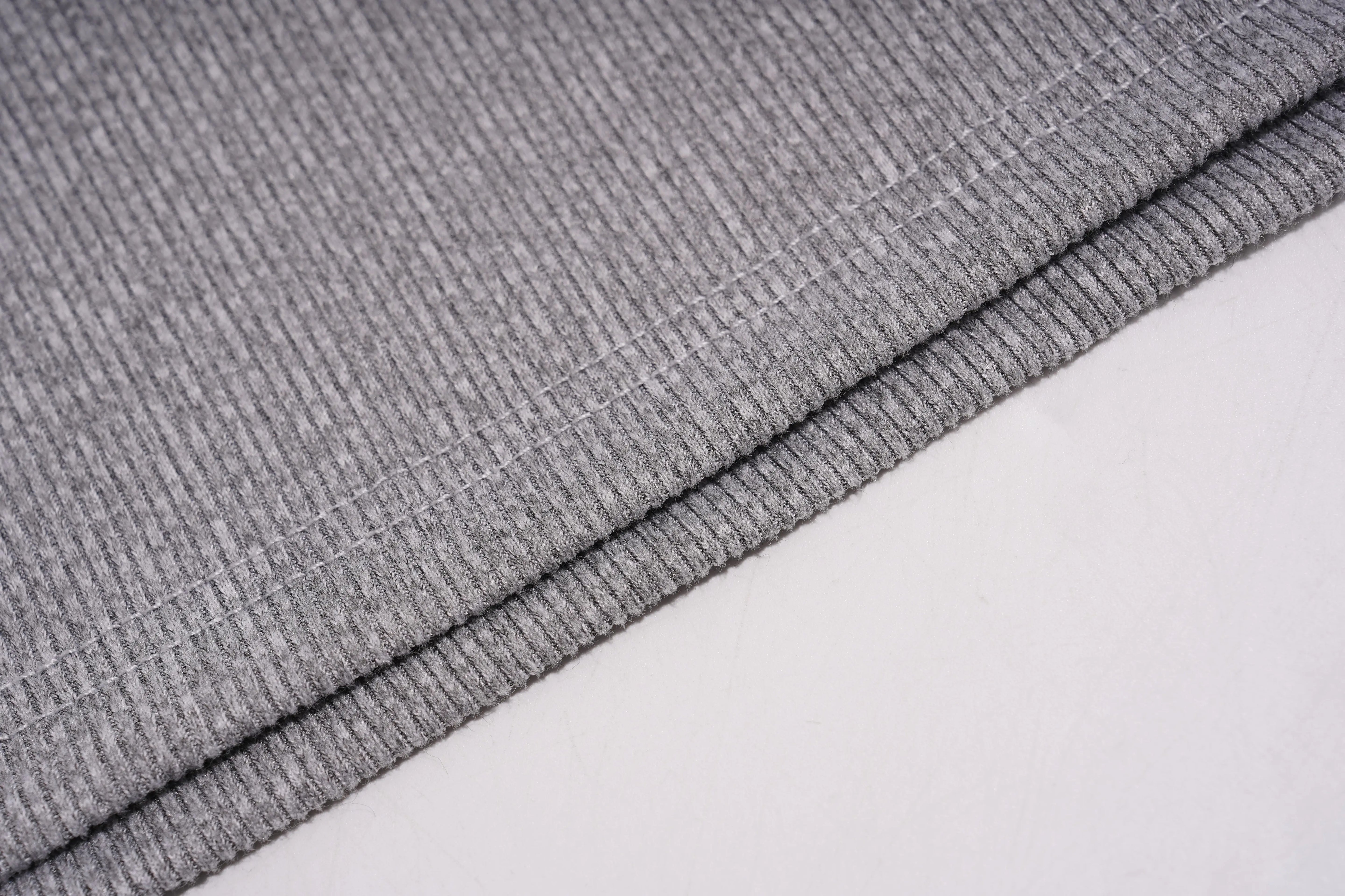 Close-up of gray textured fabric on a light gray background, TCH Rhinestone Signature Ribbed Tank Top
