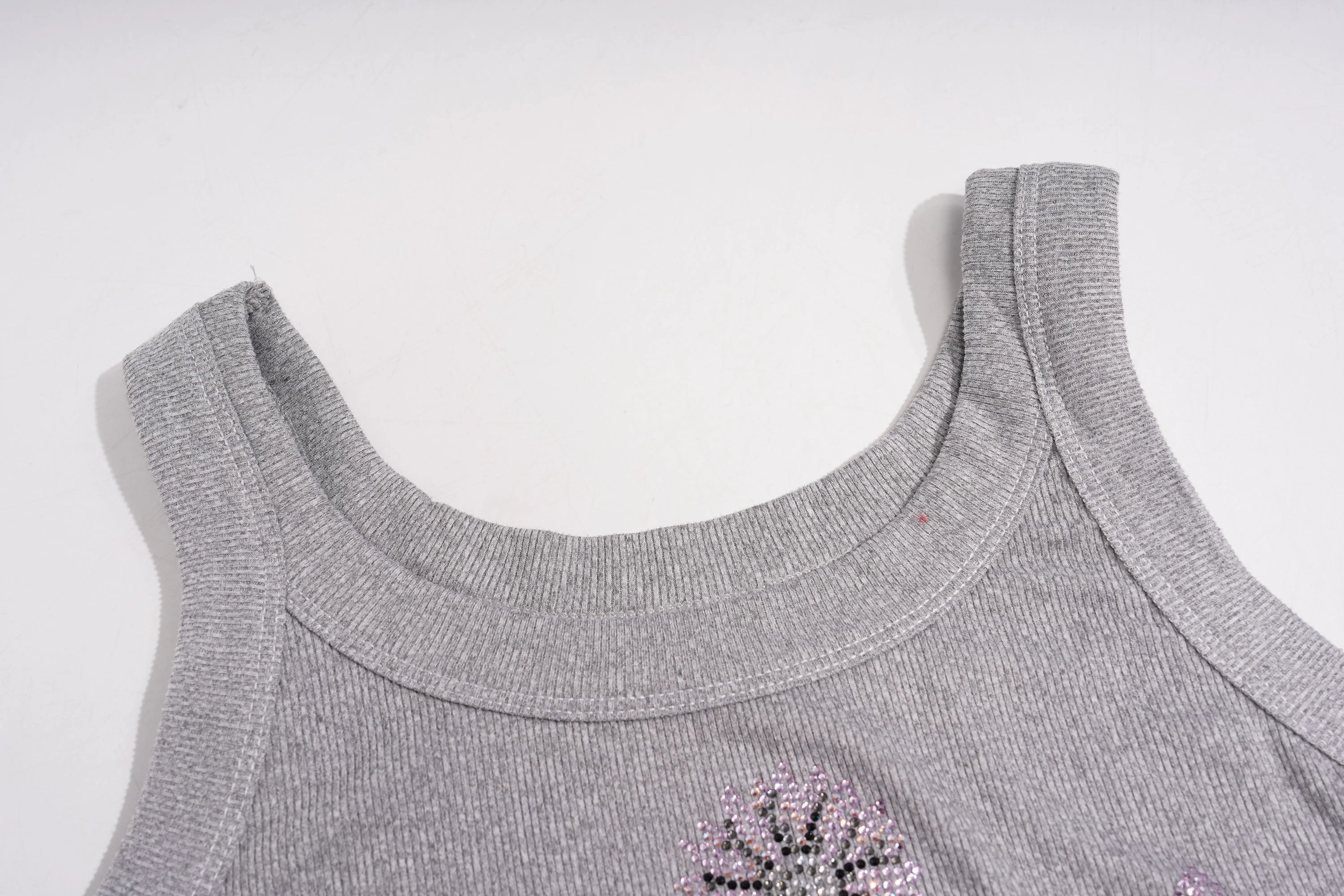 Gray tank top with a decorative element on a white background, TCH Rhinestone Signature Ribbed Tank Top