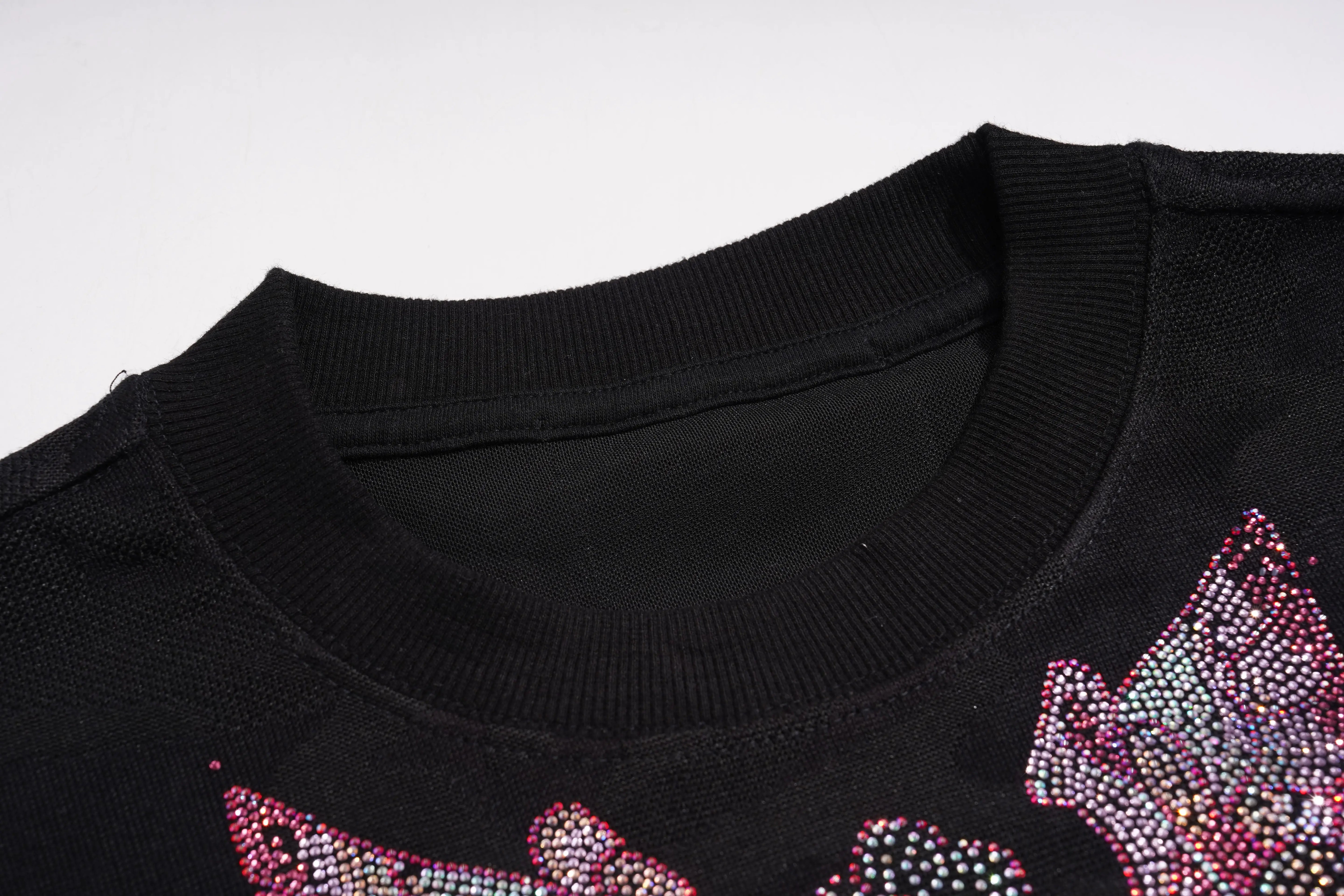 Black sweater with pink and white rhinestone design on a white background, TCH Rhinestone Snake Black Crewneck Sweatshirt