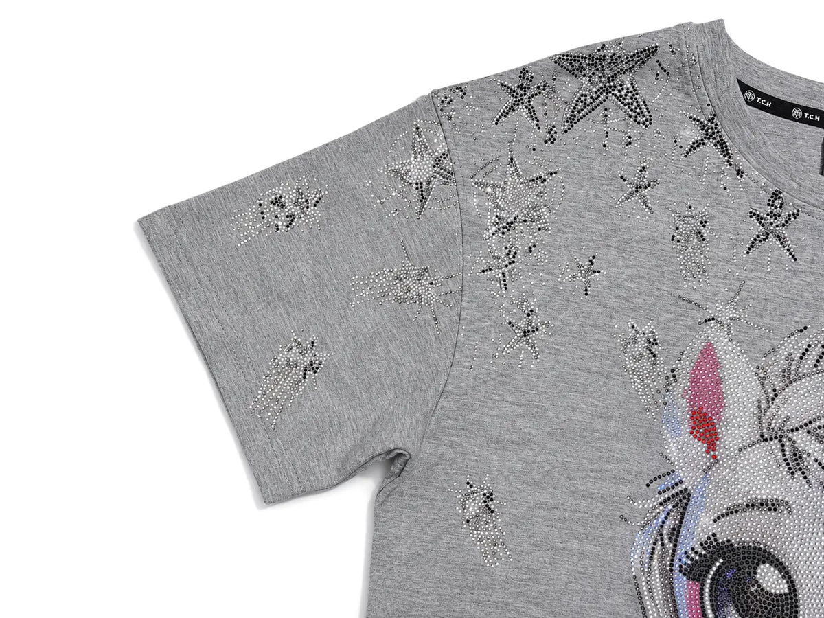 A close-up of a heather gray short-sleeve t-shirt featuring rhinestone star embellishments and a large rhinestone graphic of a unicorn on the front, shown against a plain white background. TCH Rhinestone Techno Unicorn Graphic T-Shirt