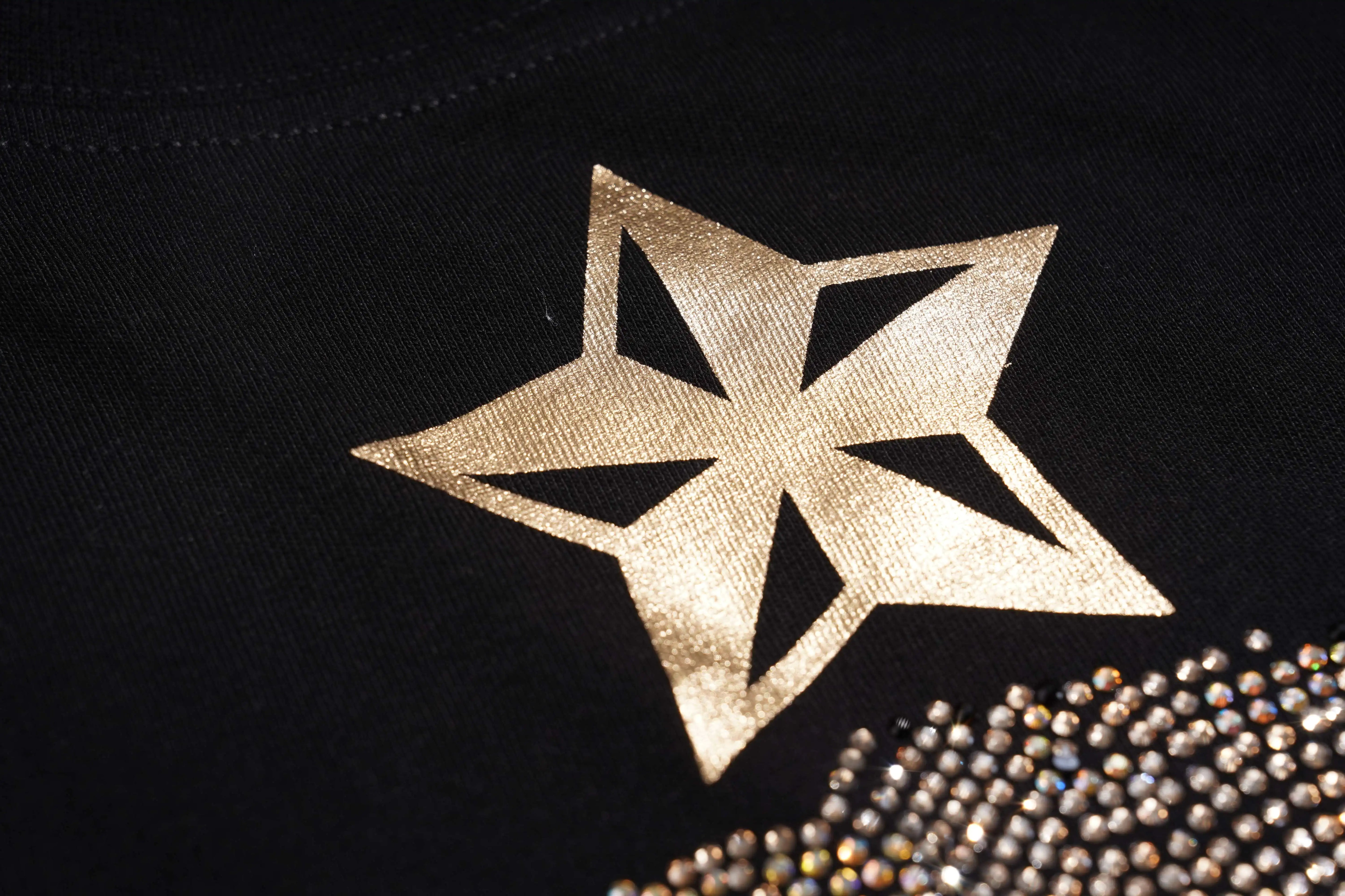 Gold star design on a black background with rhinestone embellishments. TCH Rhinestone Teddy Bear Black T-Shirt