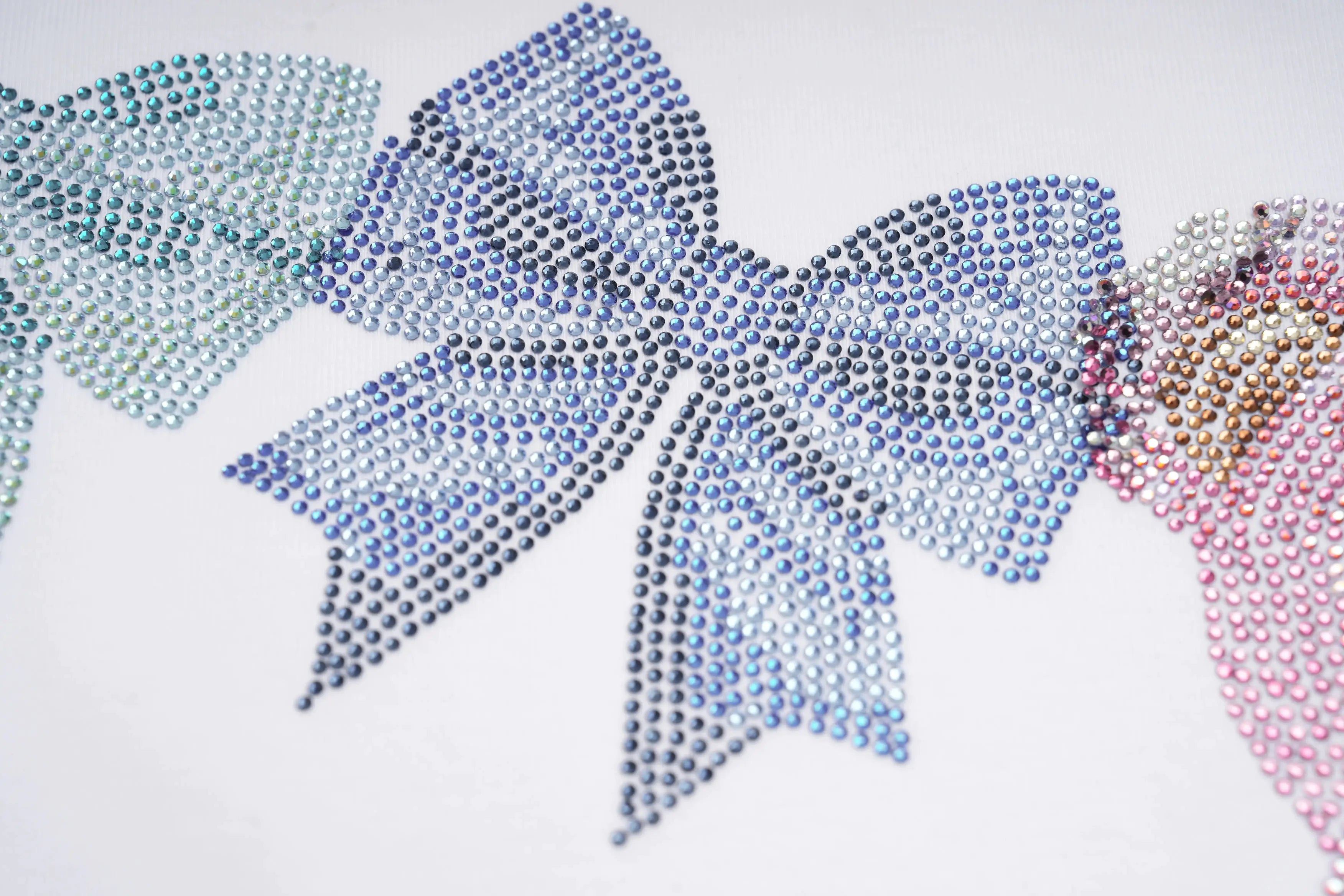 Decorative bow made of rhinestones in various colors on a white background, TCH Rhinestone Teddy Bear & Bow Graphic T-Shirt