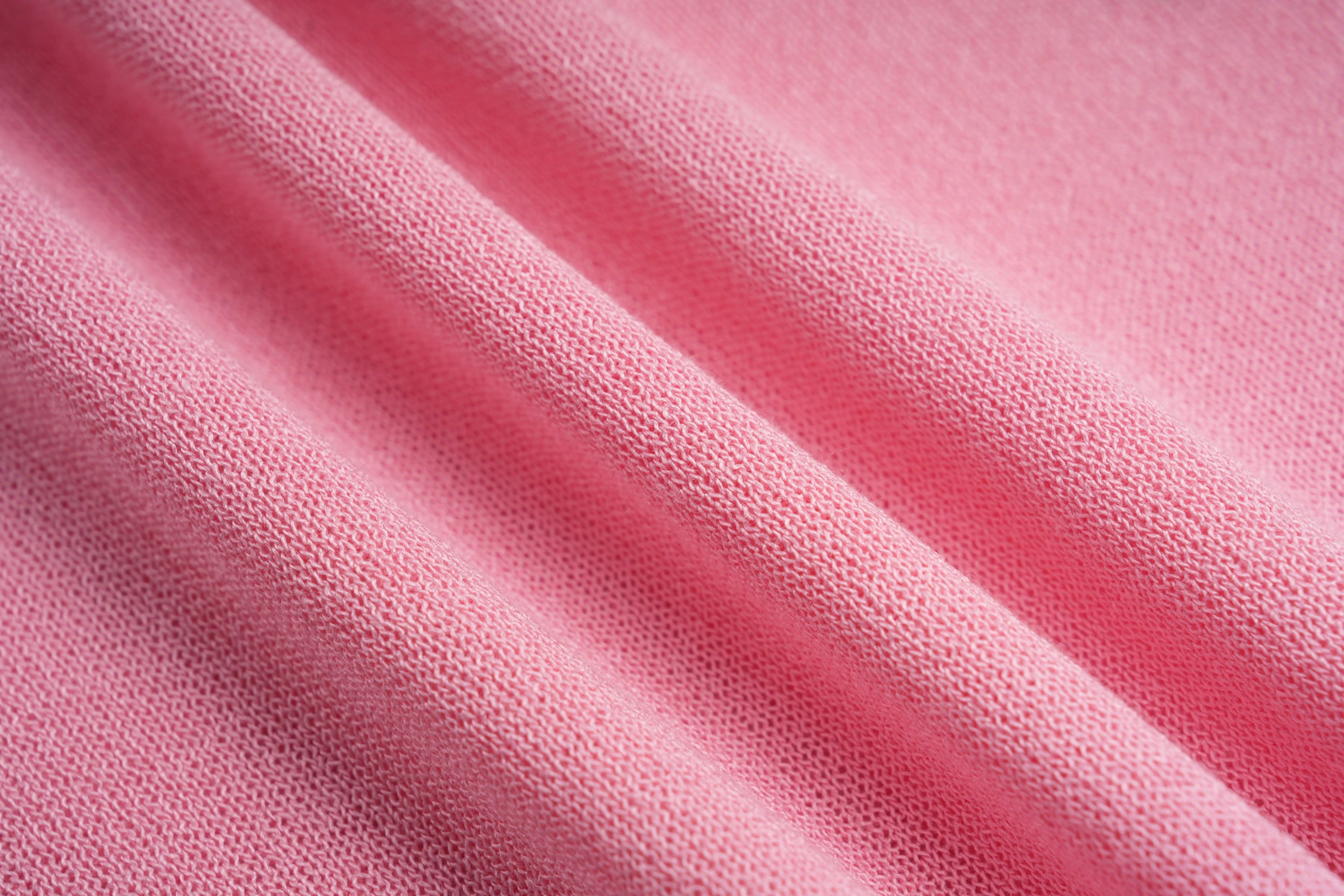 Close-up of pink fabric with a soft texture, TCH Rhinestone Teddy Bear & Bow Pink Long Sleeve Top