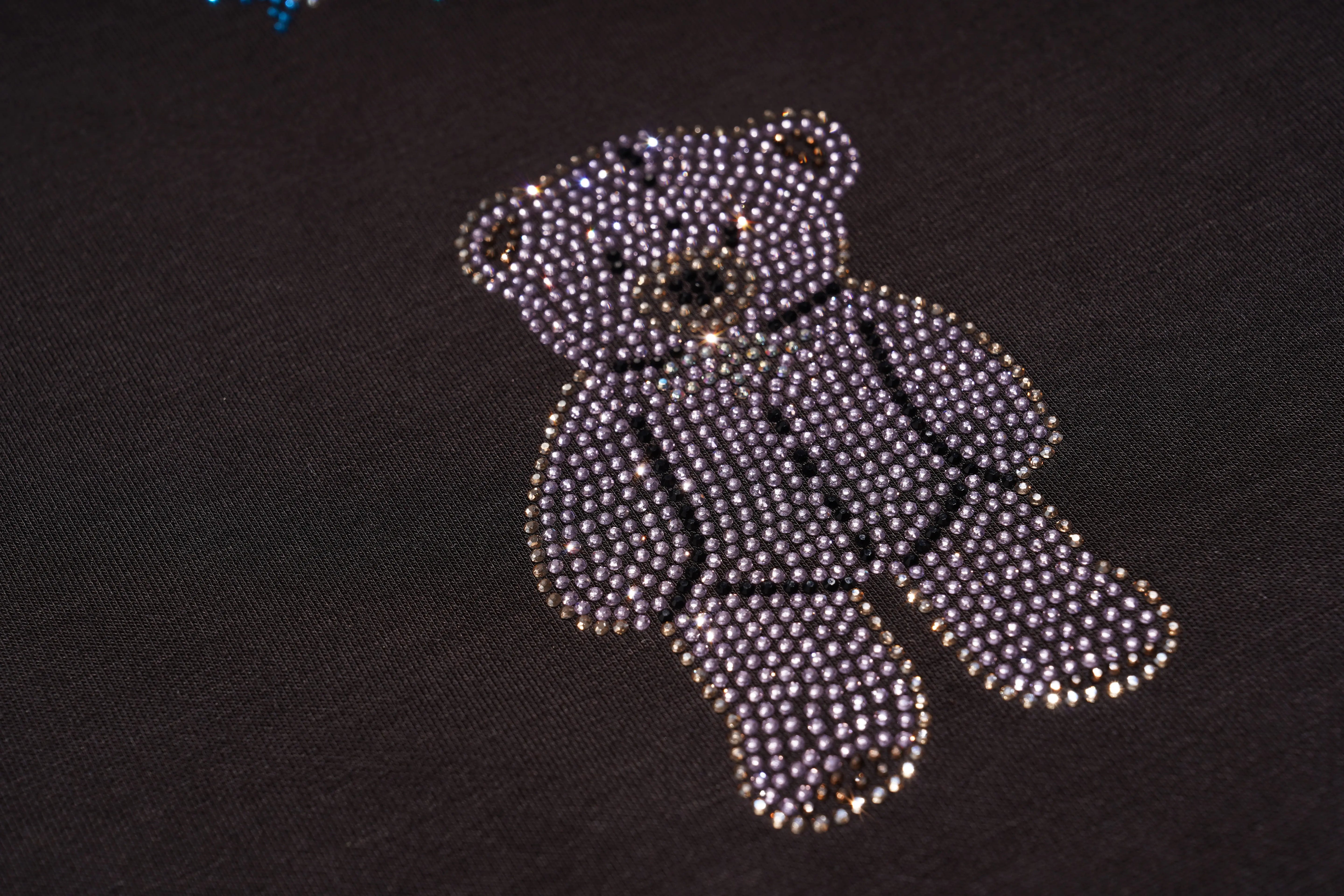 Teddy bear made of small beads on a dark background, TCH Rhinestone Teddy Bear & Bow Set