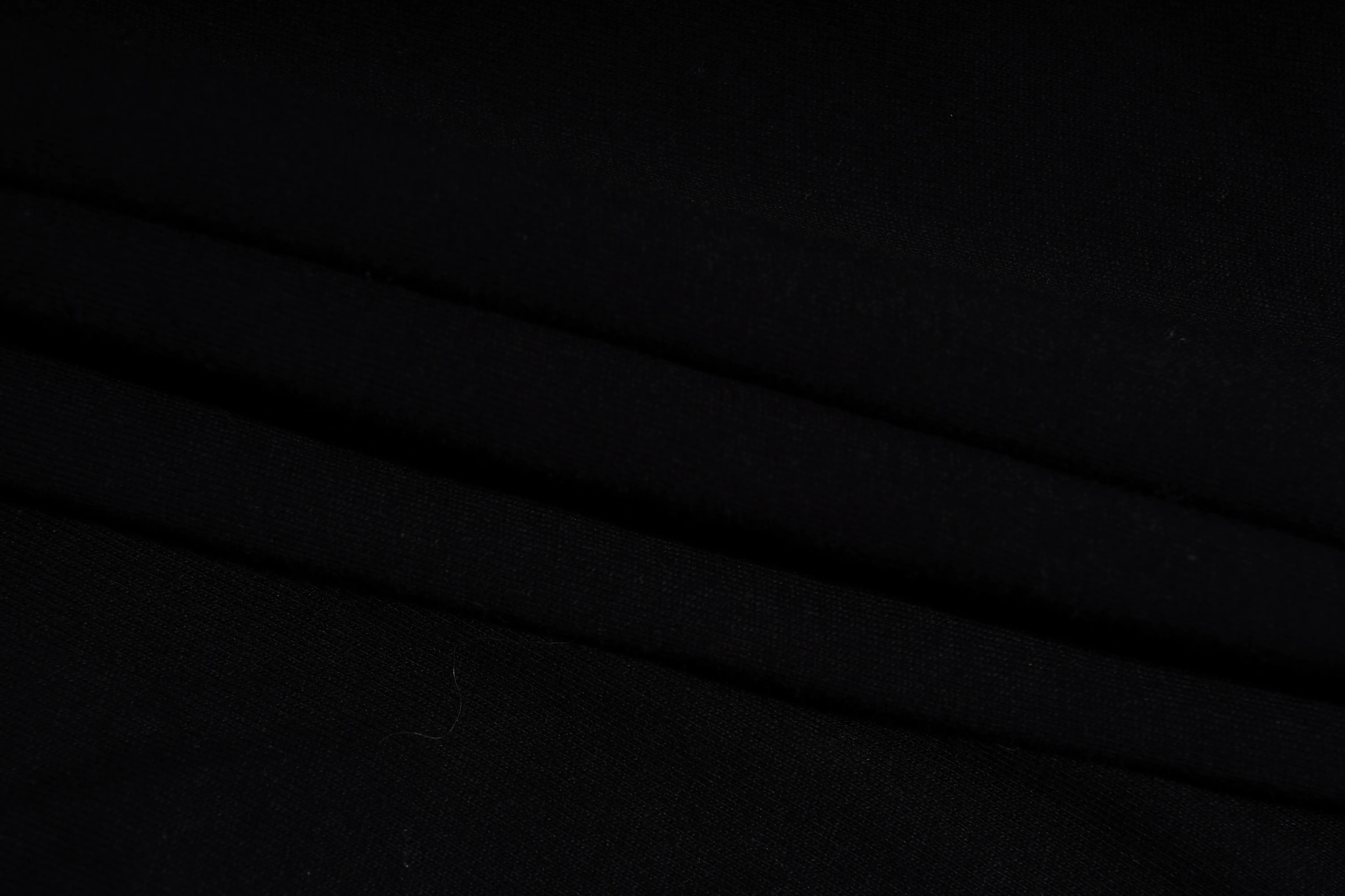 Black background with subtle texture