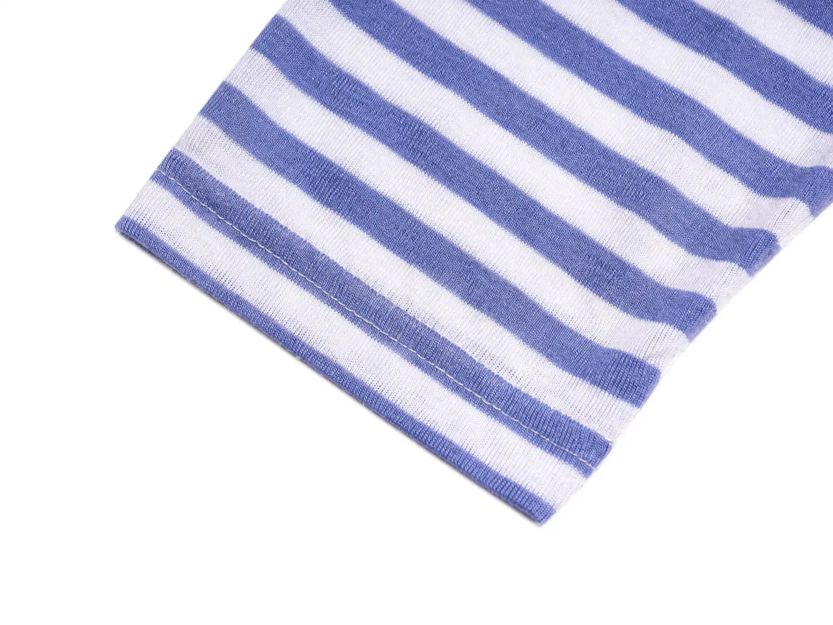 A close-up of a ribbed knit fabric with horizontal blue and white stripes, shown folded on a plain white background. TCH Rhinestone Teddy Bear Graphic Striped Sleeve Long Sleeve Top