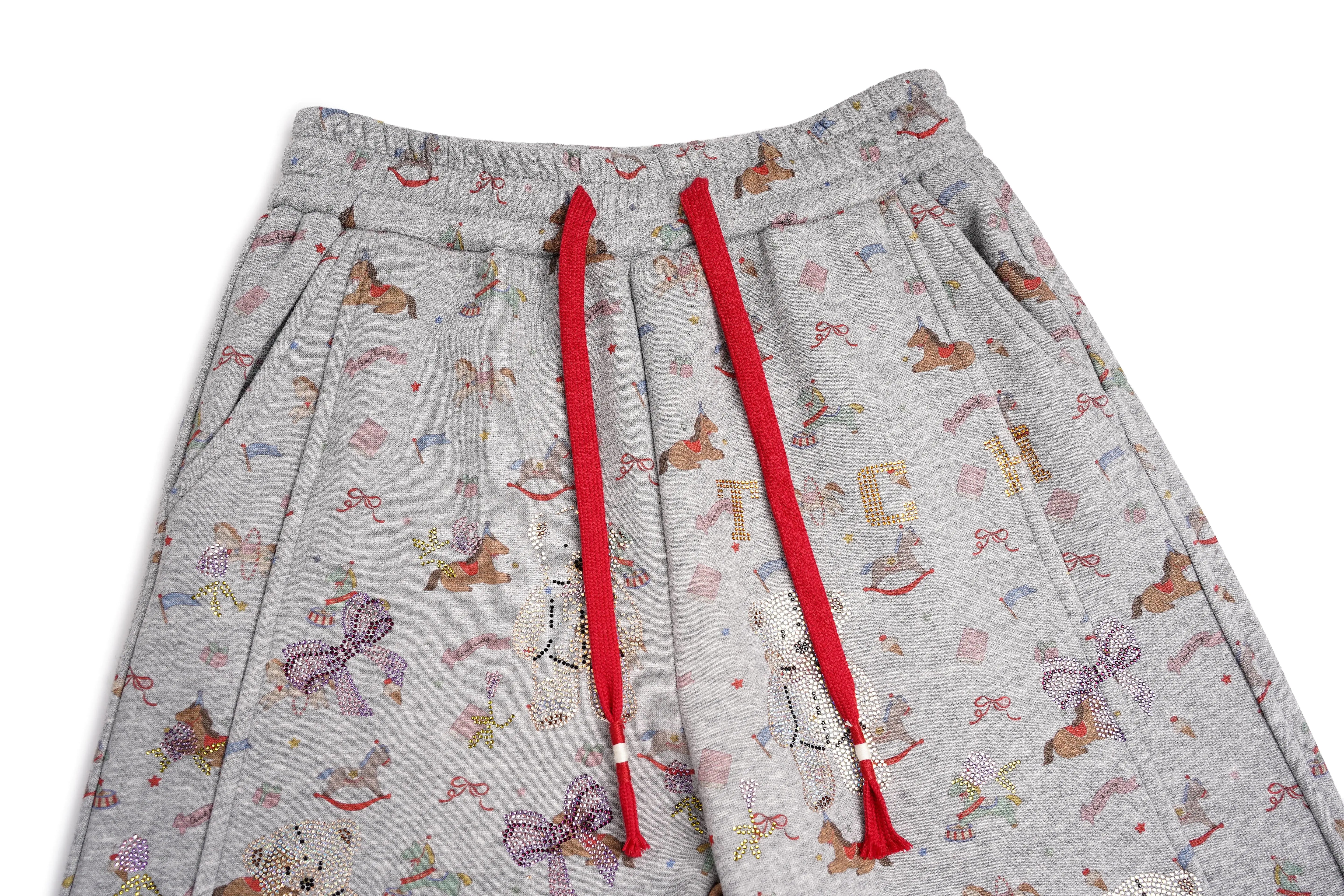 Gray sweatpants with a colorful pattern and red drawstrings on a white background, TCH Rhinestone Teddy Bear Grey Printed Pants