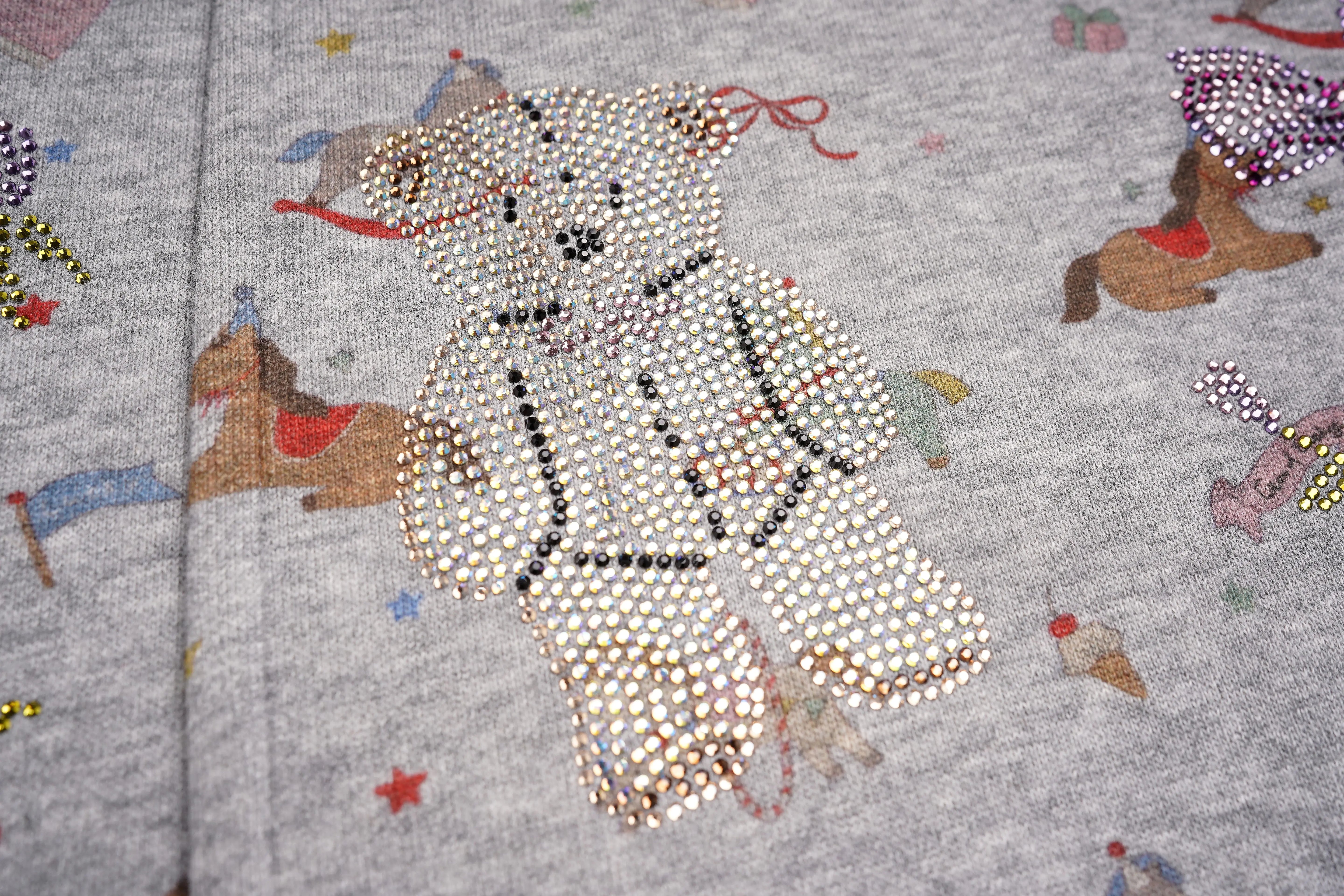 Decorative fabric with a teddy bear design made of rhinestones on a gray background. TCH Rhinestone Teddy Bear Grey Printed Pants
