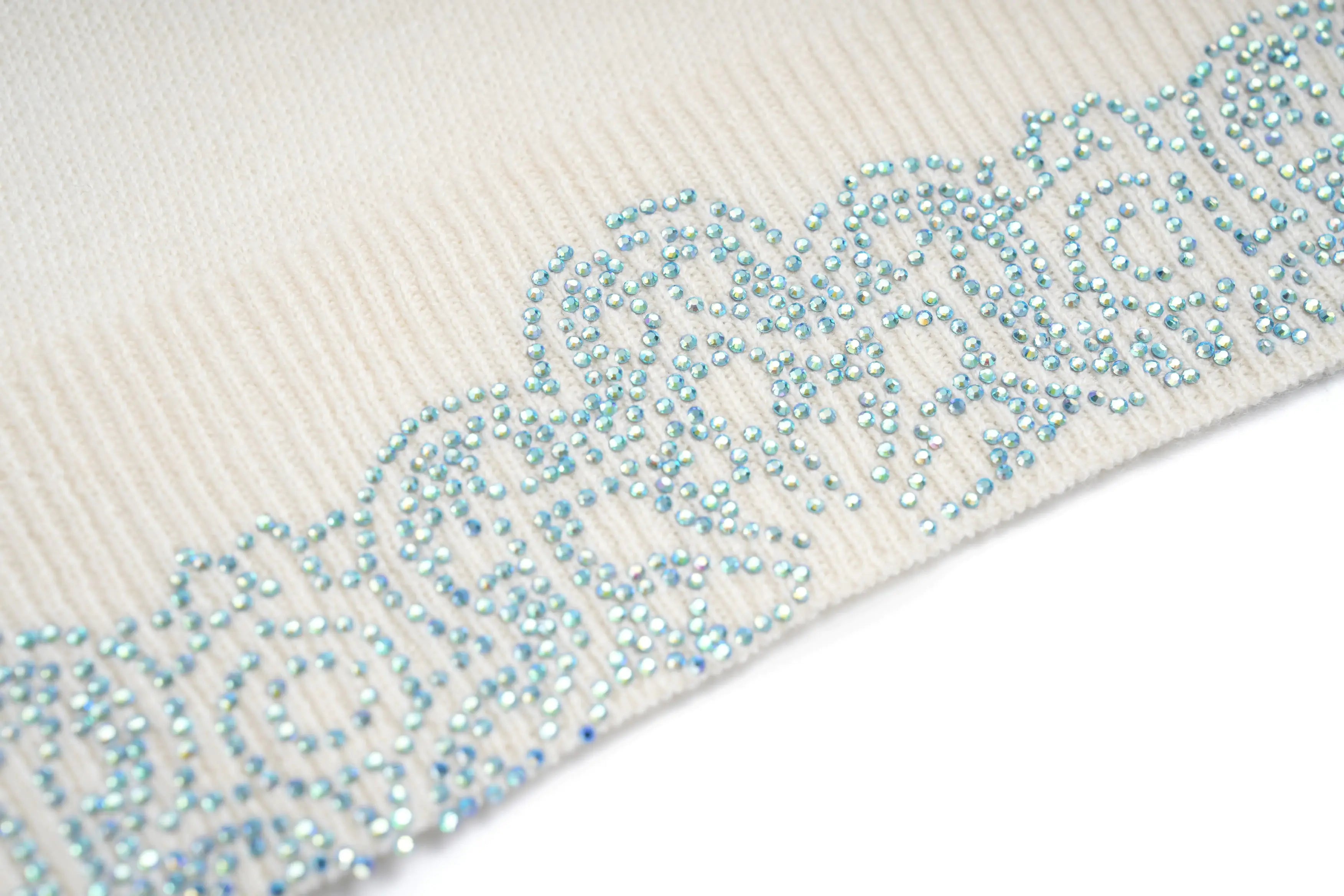 Close-up of a decorative trim with rhinestones on a white background, TCH Rhinestone Teddy Bear Hooded Knit Tee