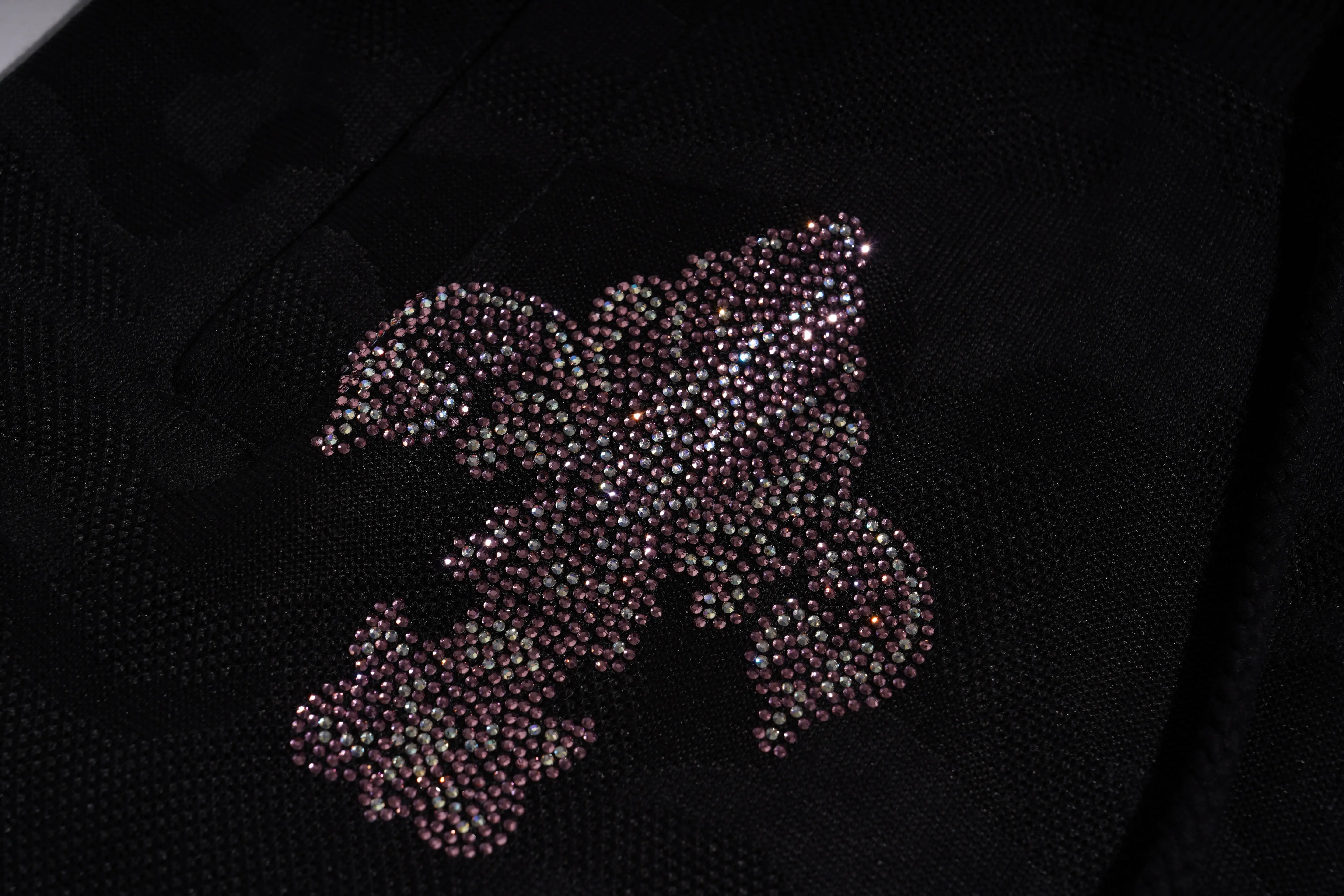Decorative brooch with rhinestones on a black background, TCH Rhinestone Wing Camo Jogger Pants