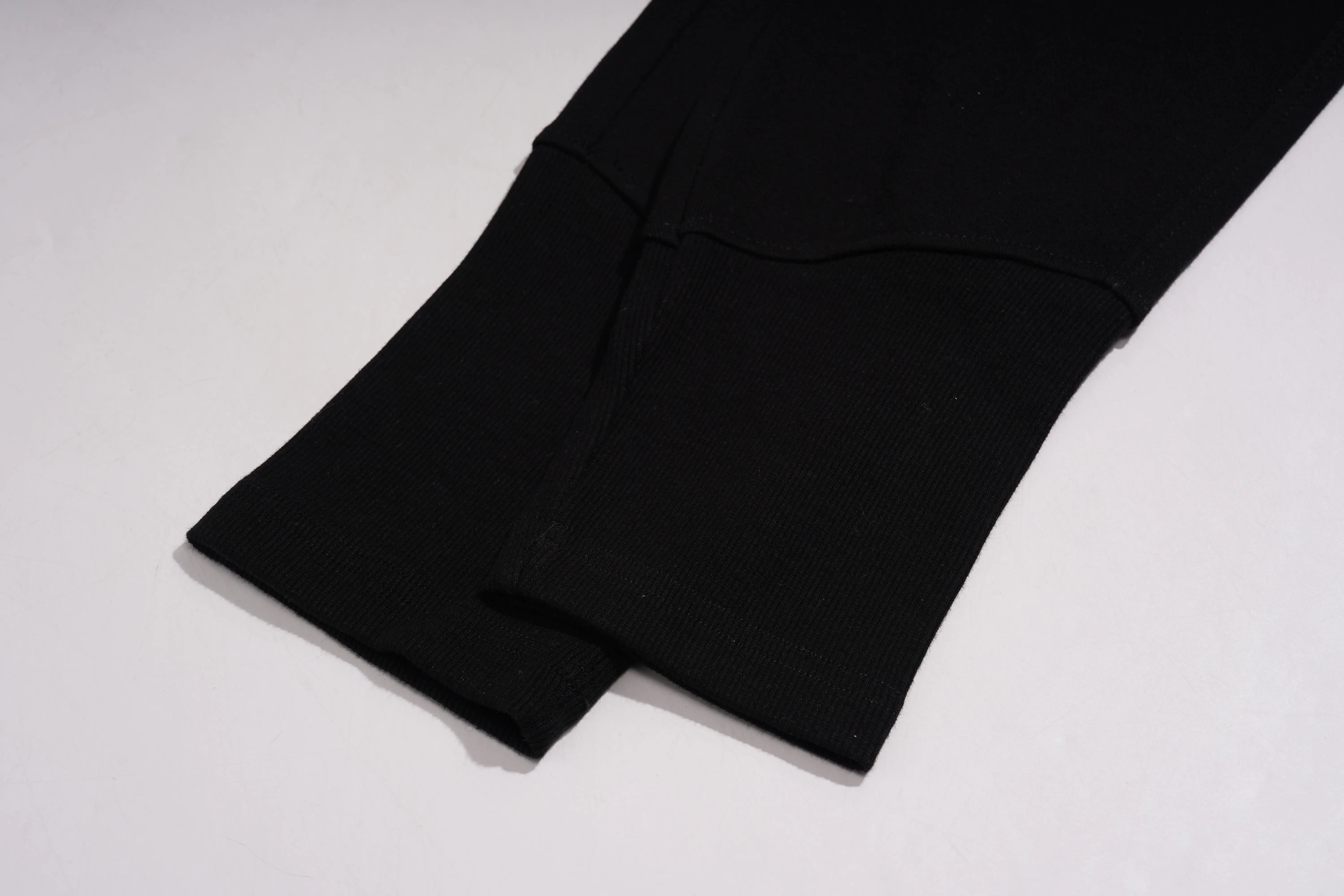 Black fabric on a white background, TCH TECHNO Rhinestone Jogger Pants